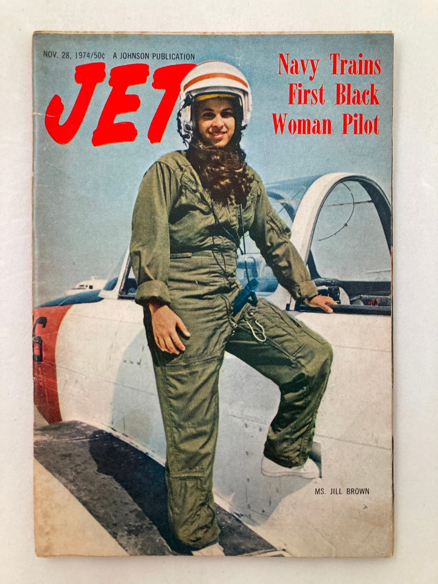 Cover of VTG Jet Magazine November 28 1974 Vol 47 #10 featuring Ms. Jill Brown, the first Black woman pilot, standing beside an aircraft in a flight suit.