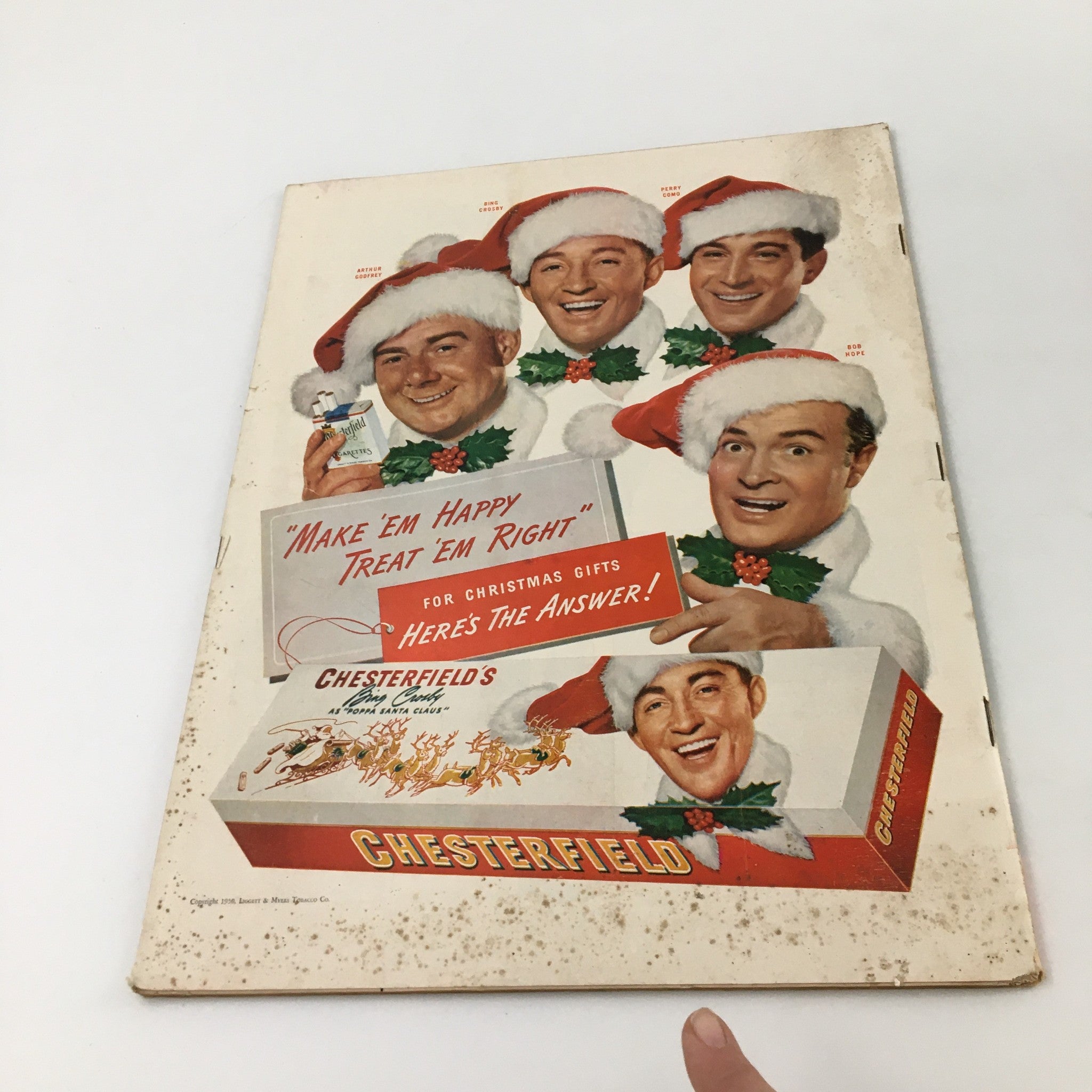 Vintage Life Magazine December 25, 1950 cover featuring an advertisement for Chesterfield cigarettes with festive imagery, showcasing smiling men in Christmas attire promoting holiday gift ideas.