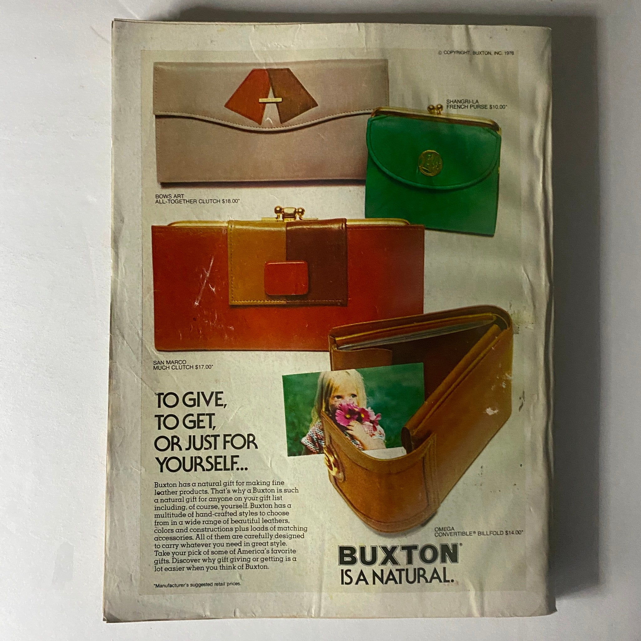 Glamour Magazine August 1976 advertisement page highlighting stylish leather bags with product descriptions, emphasizing fashion in the 1970s.