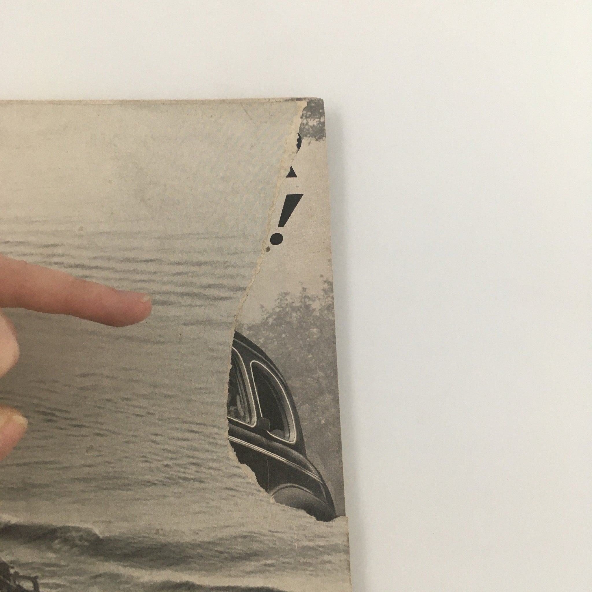 Detail of the back cover of VTG Life Magazine November 20 1939 showing wear with a tear and a section of the cover missing.