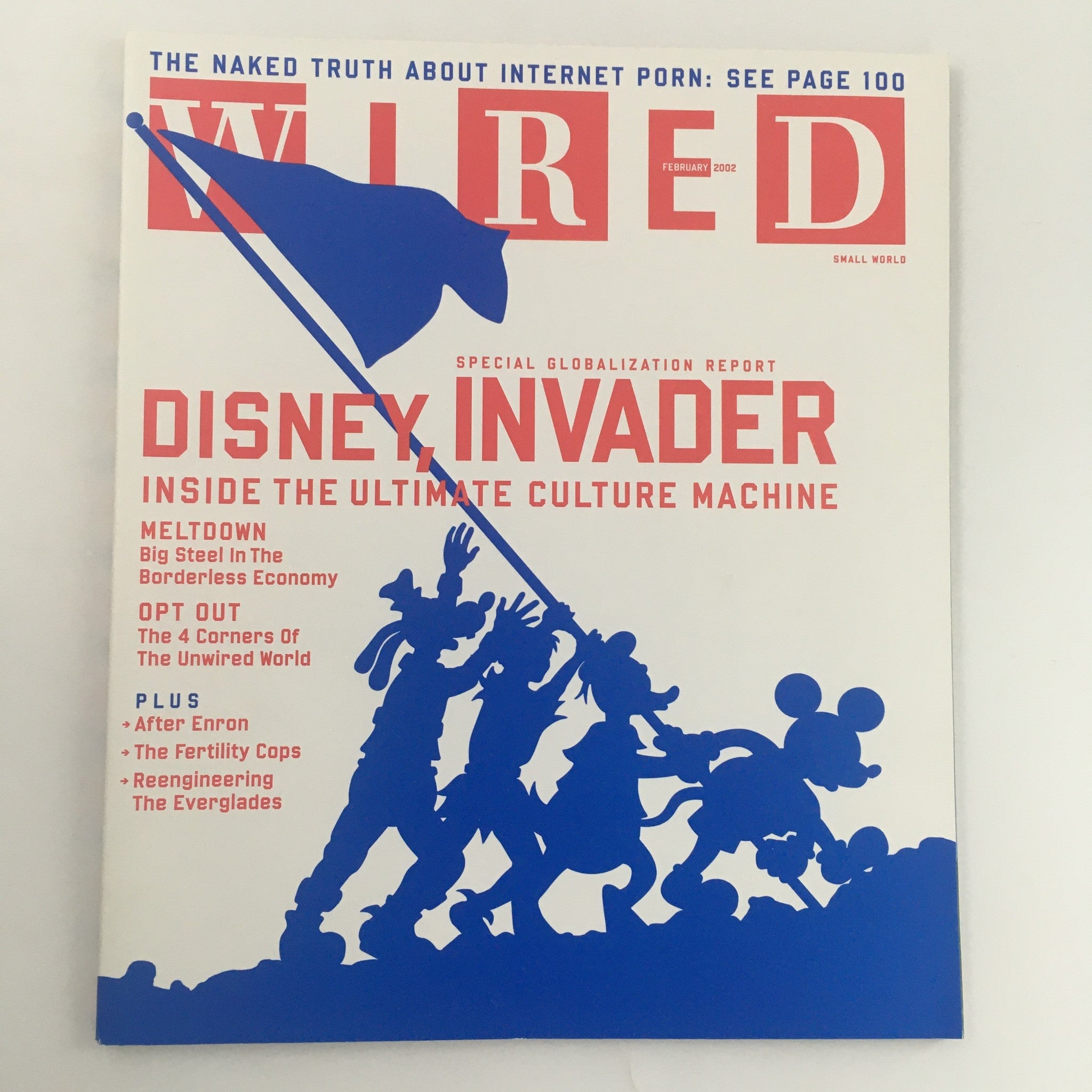 Wired Magazine February 2002 cover featuring the title 'Disney Invader: Inside the Ultimate Culture Machine' with a silhouette of Disney characters and a prominent flag, highlighting the magazine's special globalization report.