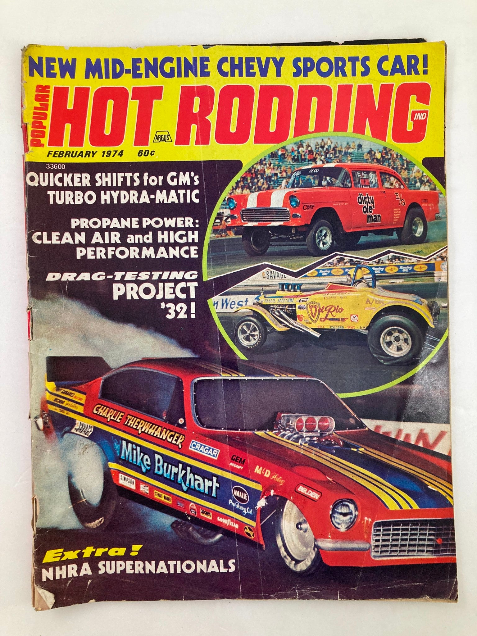 Cover of VTG Hot Rodding Magazine February 1974 Vol 13 #2 featuring New Mid-Engine Chevy Sports Car with vibrant colors and racing cars.