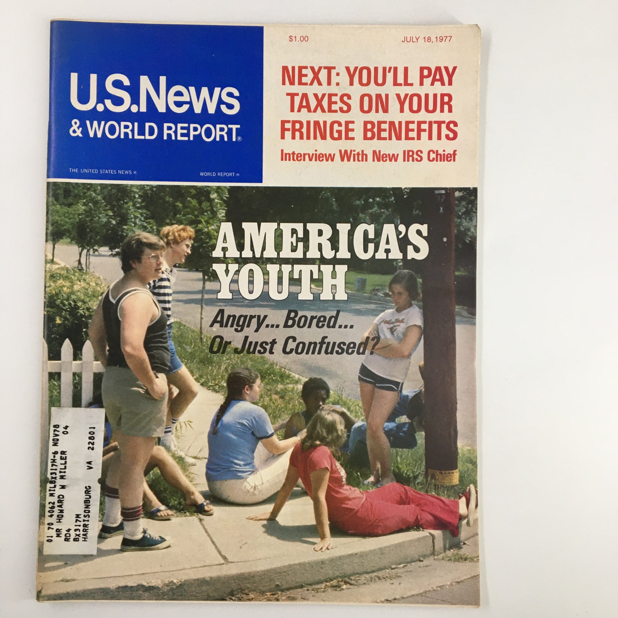 Cover of US News & World Report Magazine from July 18, 1977, featuring the title 'America's Youth: Angry... Bored... Or Just Confused?', showcasing a group of youth gathered on a sidewalk.