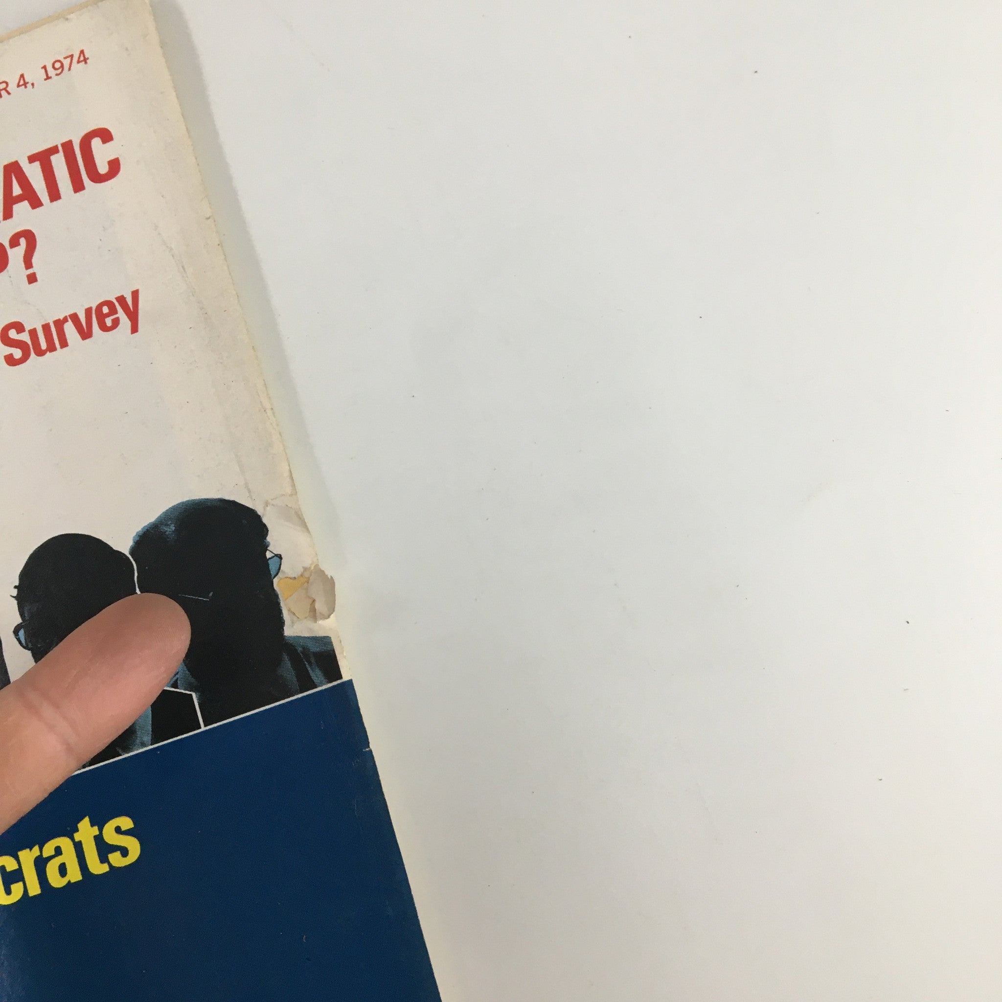 Close-up of the US News & World Report Magazine cover from November 4, 1974, highlighting the section titled 'Washington's Bureaucrats' and a glimpse of the accompanying silhouettes.