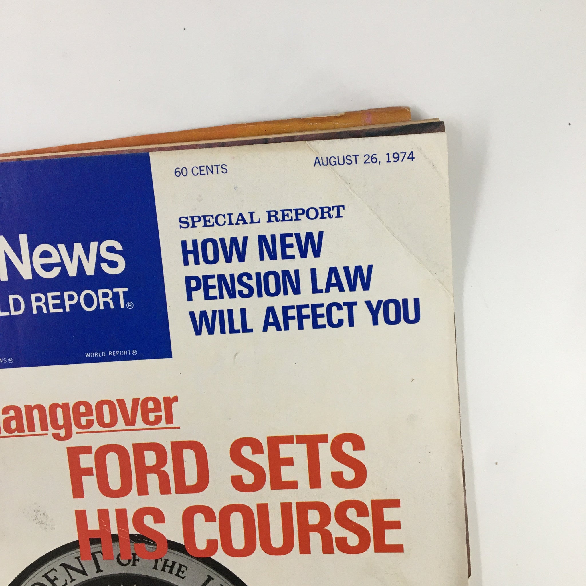 Close-up view of the US News & World Report Magazine cover dated August 24, 1974, highlighting the title 'Ford Sets His Course' and the special report on how new pension laws will affect readers.