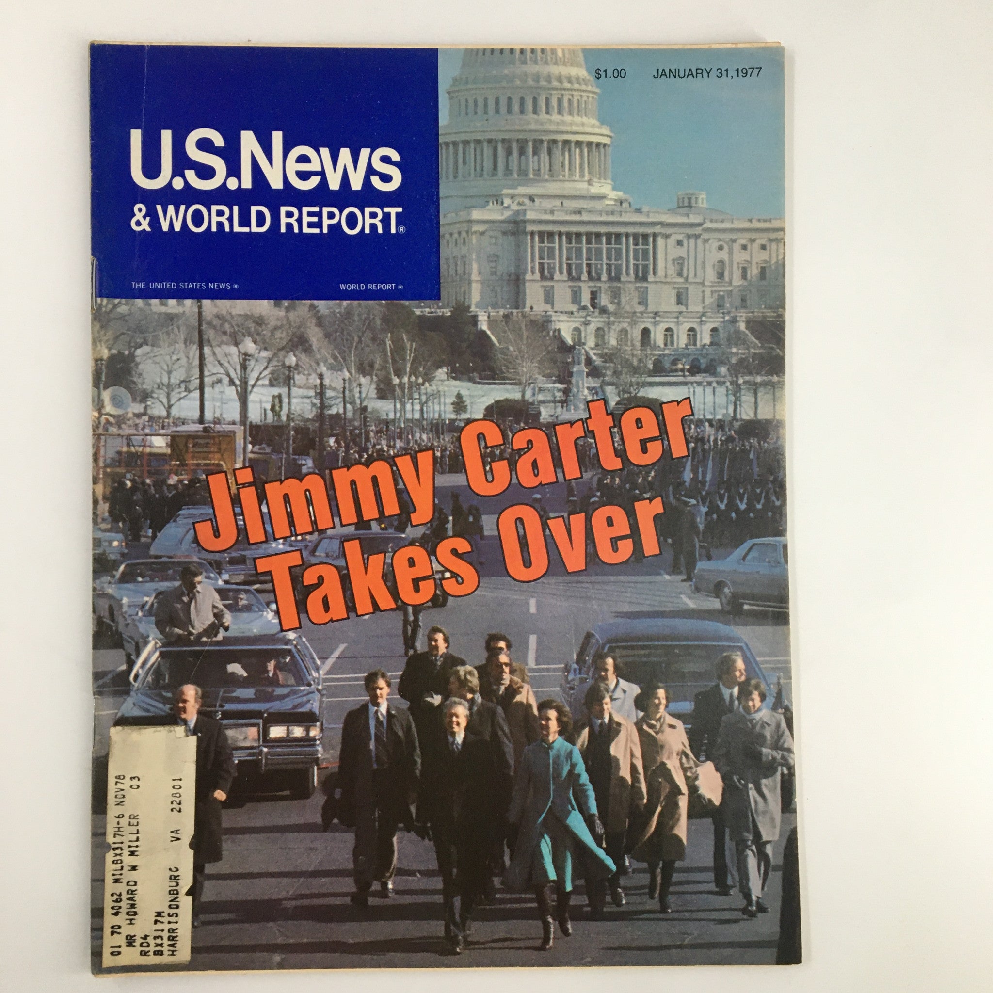 Cover of US News & World Report magazine, January 31, 1977, featuring the title 'Jimmy Carter Takes Over,' showcasing a historic moment in American politics with the U.S. Capitol in the background and a procession of people.