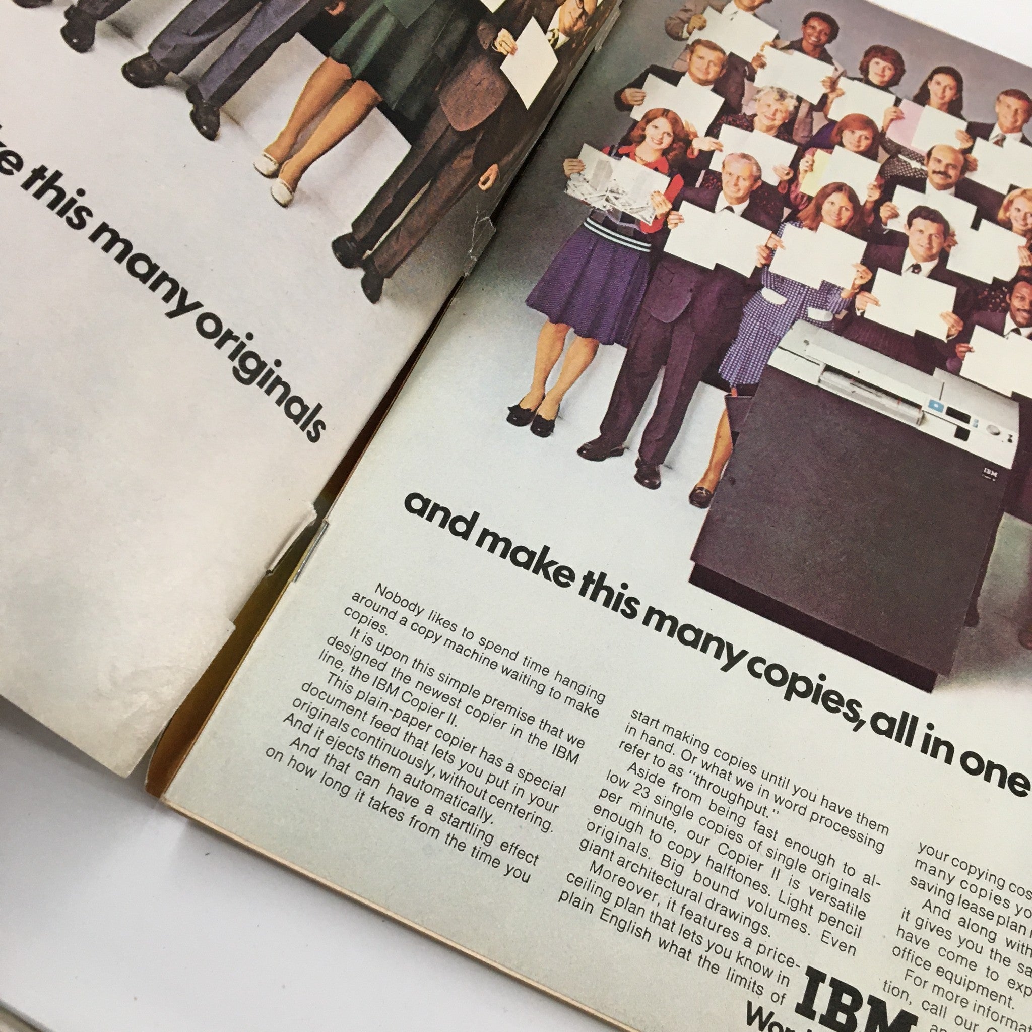 Inside spread of US News & World Report Magazine, November 5, 1973, showcasing a vintage advertisement for IBM photocopying services with a group of people holding documents.