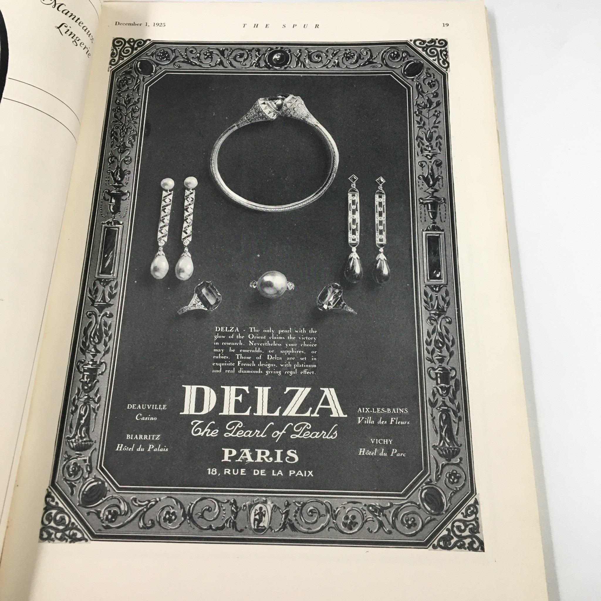 The Spur Magazine December 1 1925, displaying an advertisement for Delza, a seller of pearl jewelry in Paris.