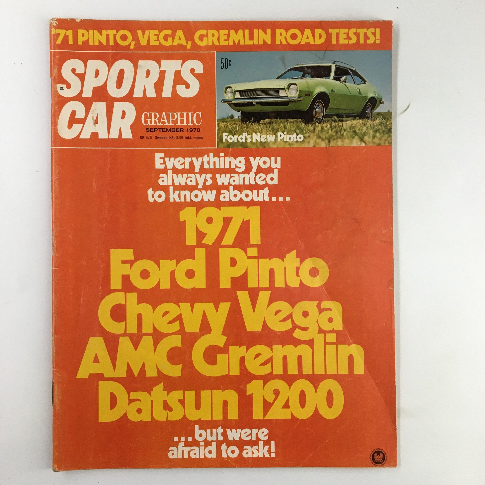 Cover of VTG Sports Car Graphic Magazine September 1970 featuring Ford Pinto and Chevy Vega, showcasing vintage car culture with bold orange cover design and prominent title.