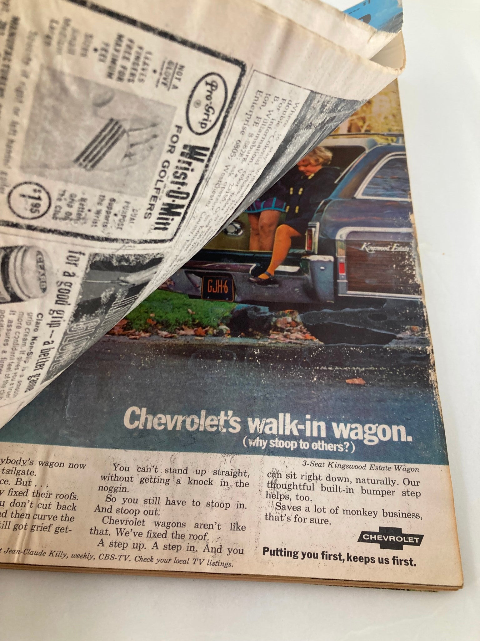 Advertisement inside VTG Golf Digest Magazine February 1969 showcasing Chevrolet's walk-in wagon with nostalgic charm.
