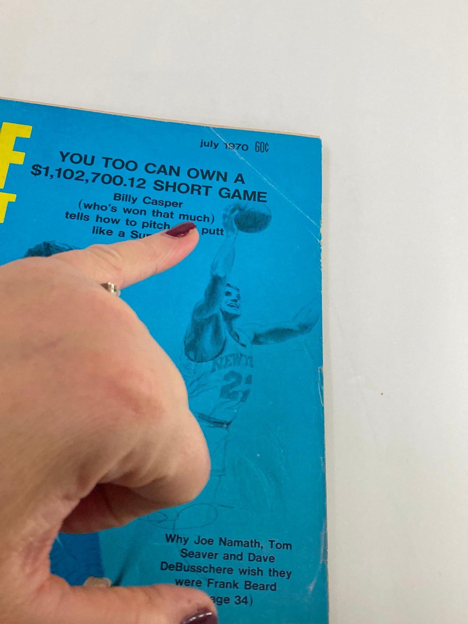 Close-up view of the Golf Digest Magazine July 1970 cover highlighting the title and key features related to Joe Namath, Tom Seaver, and Dave DeBusschere.