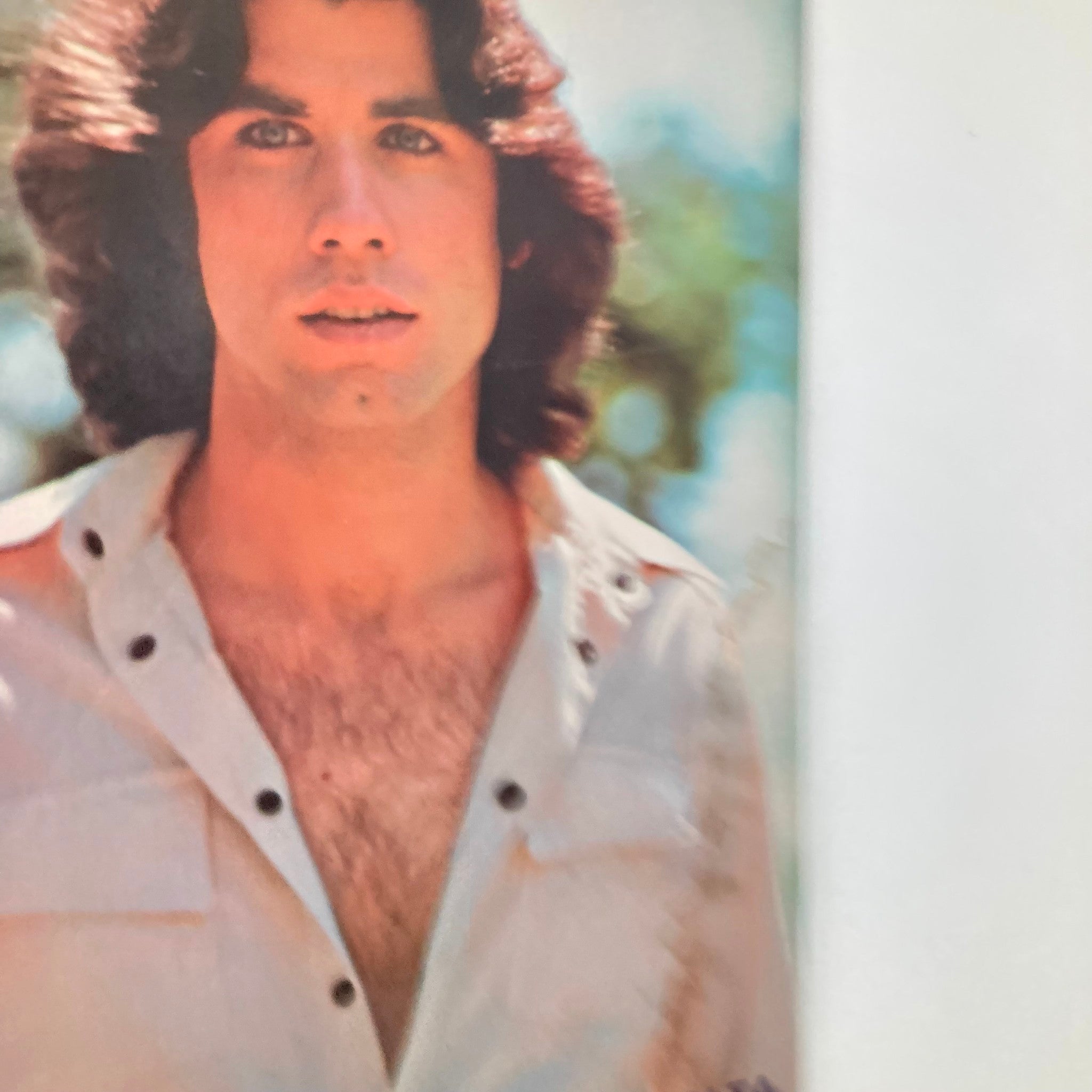A close-up image of John Travolta from VTG 16 Magazine February 1978 capturing the essence of the actor during the late 1970s.