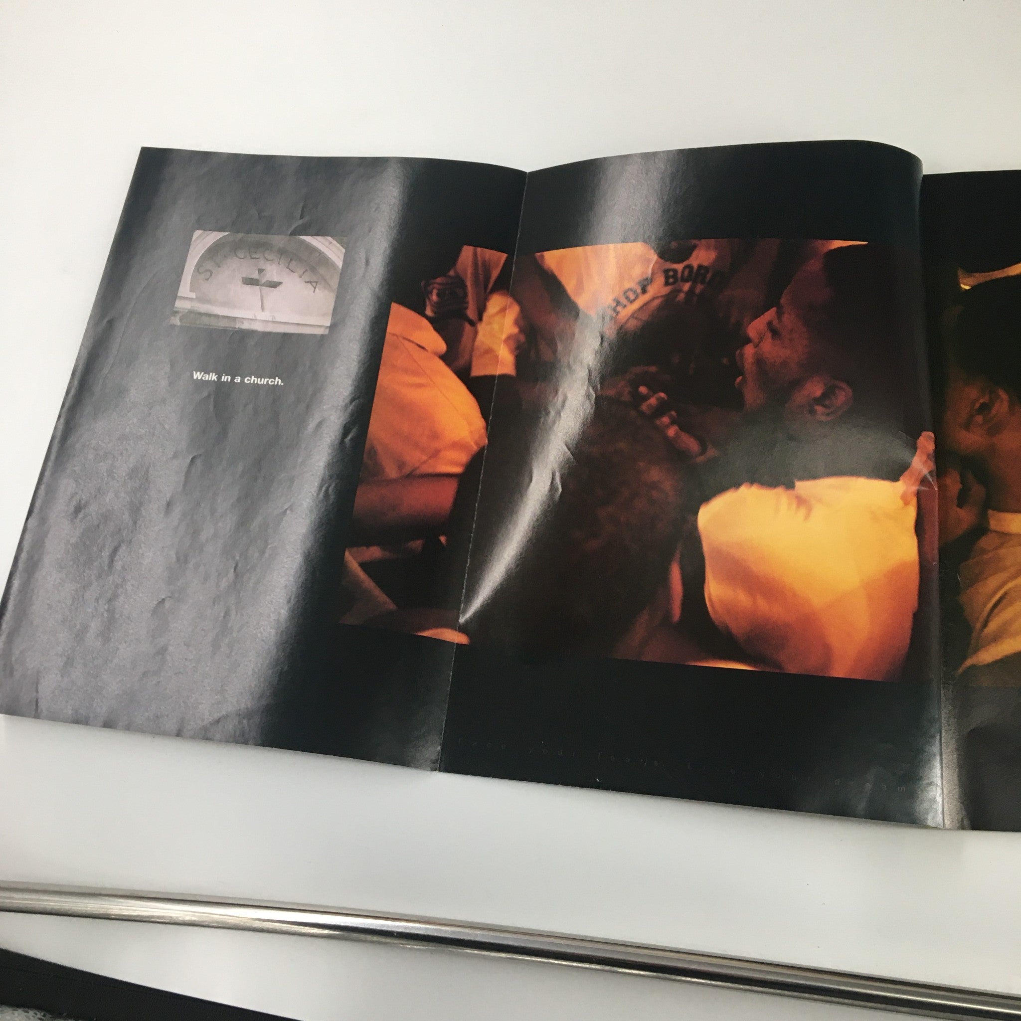 Slam Magazine February 1997 page featuring a black and white photo with the text 'Walk in a church.' showcasing basketball culture and community.