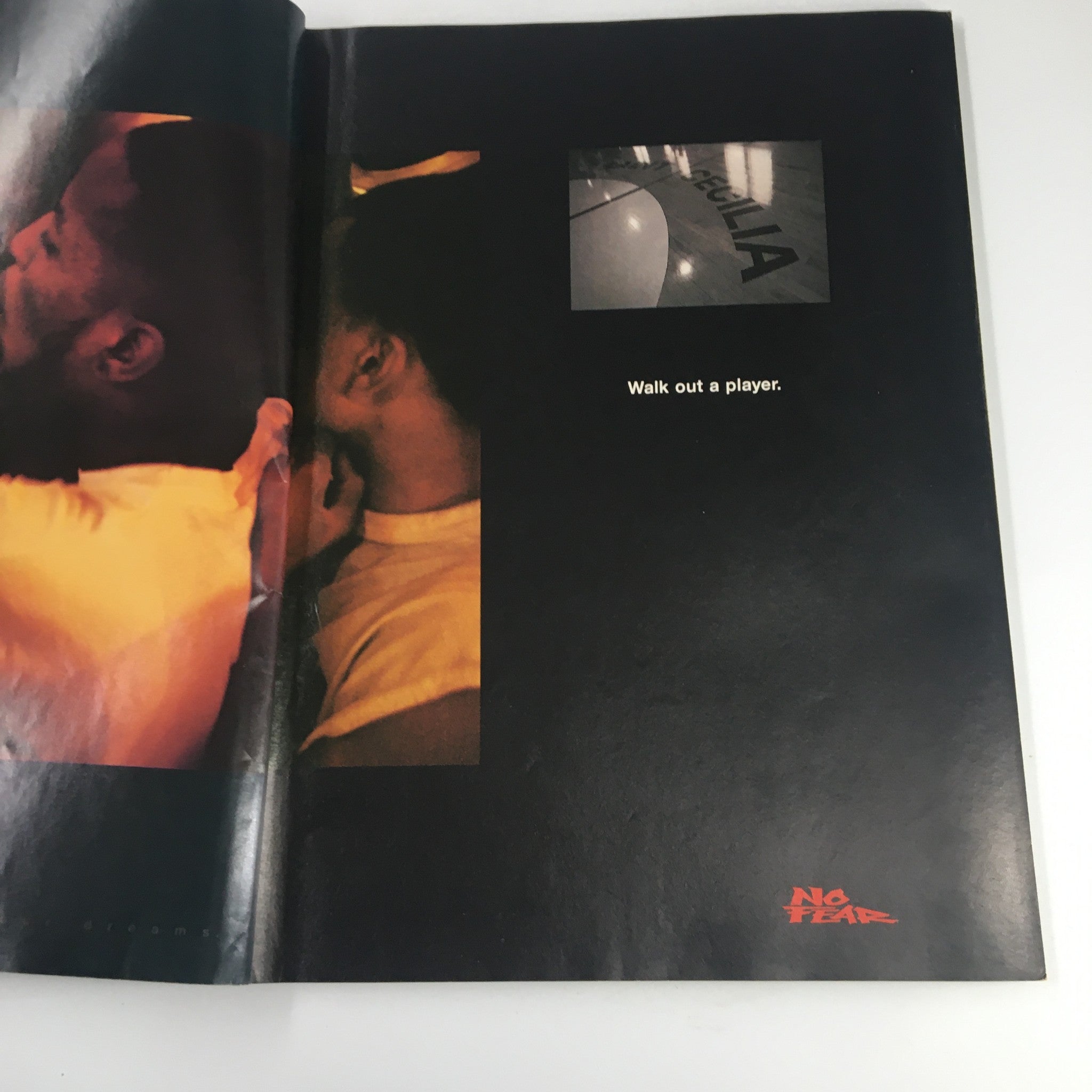 Slam Magazine February 1997 page displaying a close-up photo with the text 'Walk out a player.' highlighting the journey and transition of a basketball player.