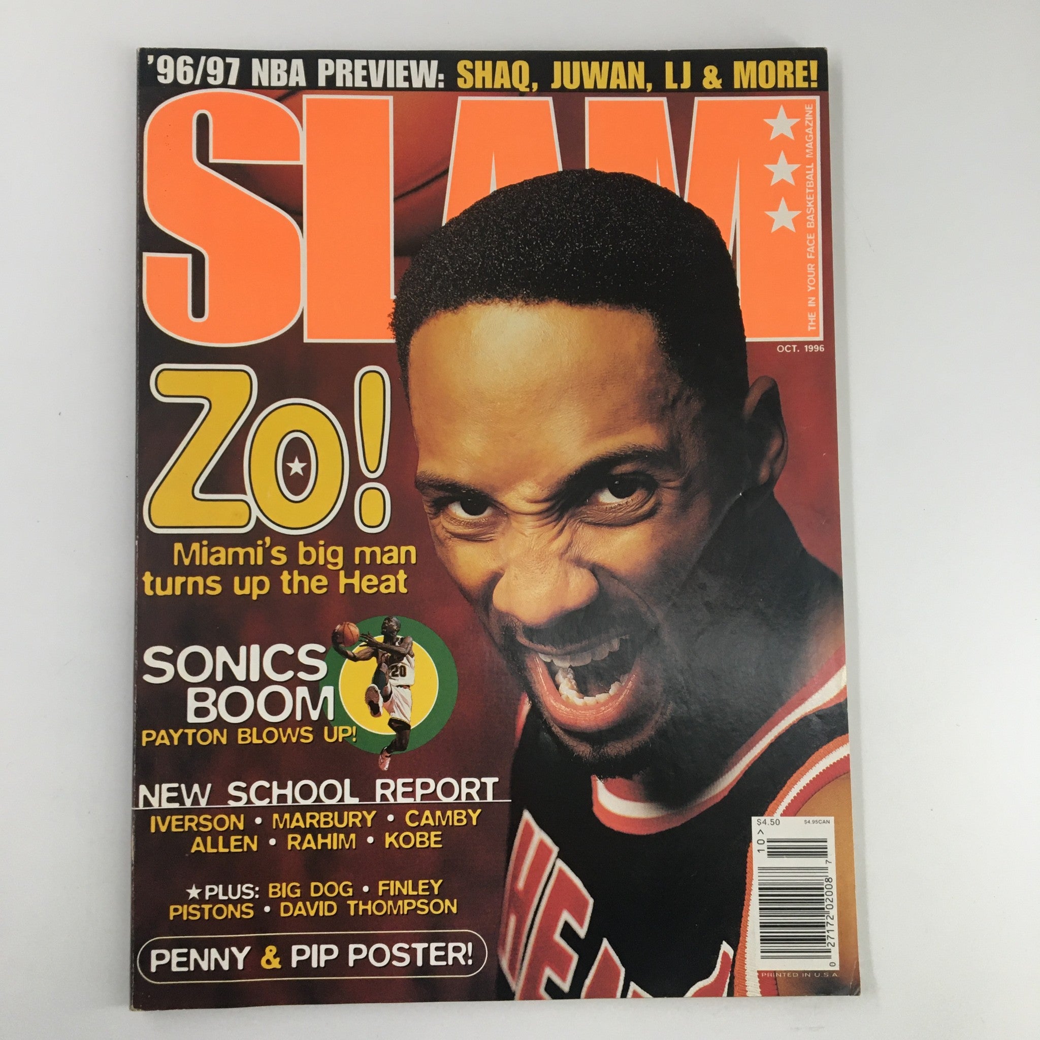 Slam Magazine October 1996 featuring Miami Heat player Alonzo Mourning on the cover. The magazine highlights NBA news and player features, including Shaquille O'Neal and Juwan Howard. Good condition with a protective cover and includes a poster.