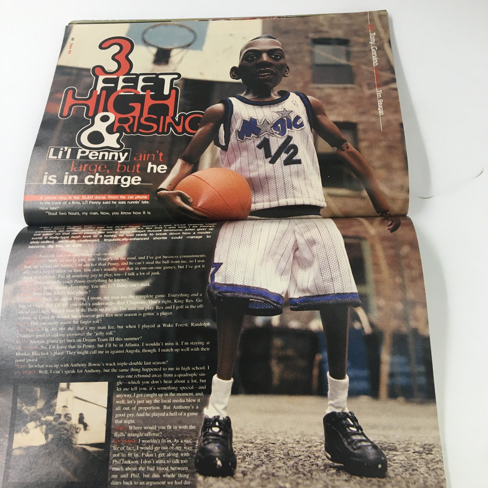 Interior page from Slam Magazine October 1996 showcasing an article about the character 'Lil' Penny' in basketball style, featuring a figurine wearing a basketball uniform. Part of the magazine's articles on NBA culture and personalities.