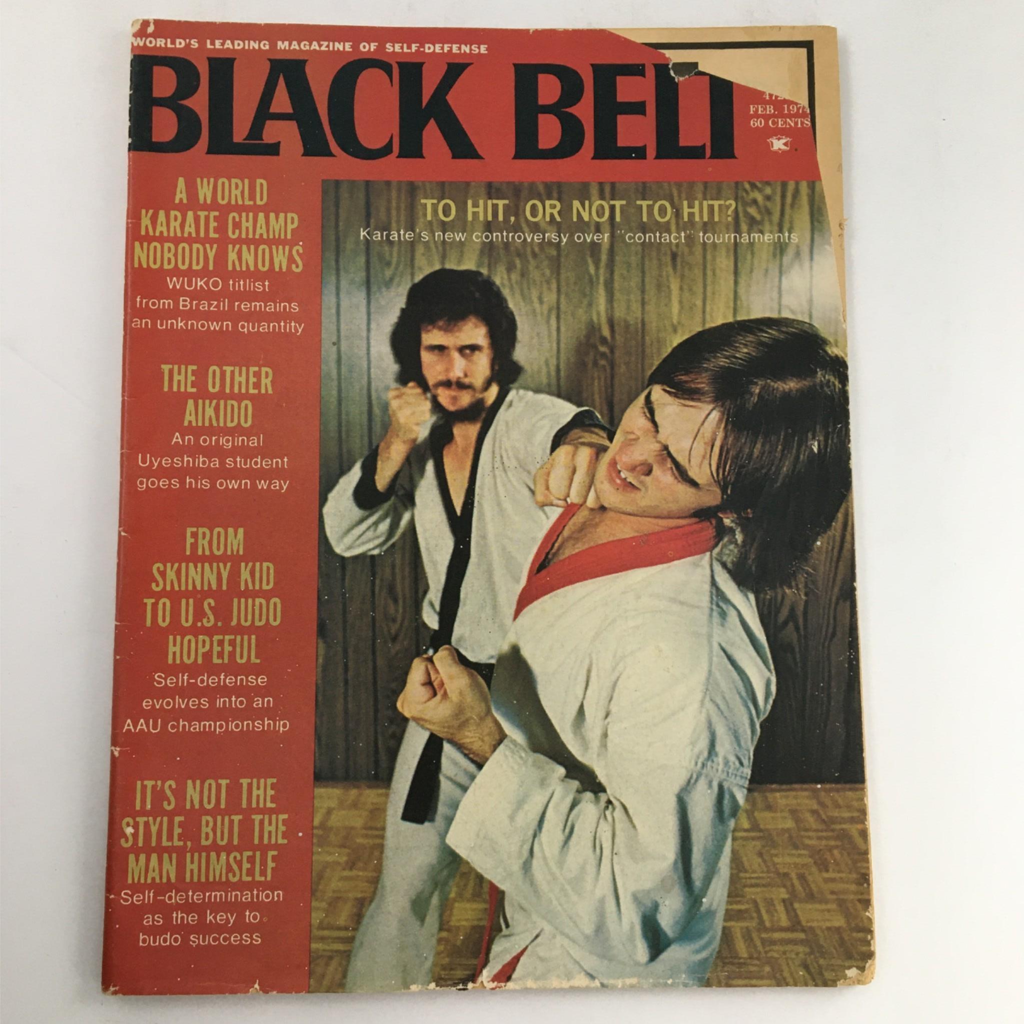 Cover of Black Belt Magazine February 1974 featuring martial artists engaged in combat, highlighting martial arts culture of the era. The magazine includes articles on karate and aikido, making it a valuable collector's item for enthusiasts.
