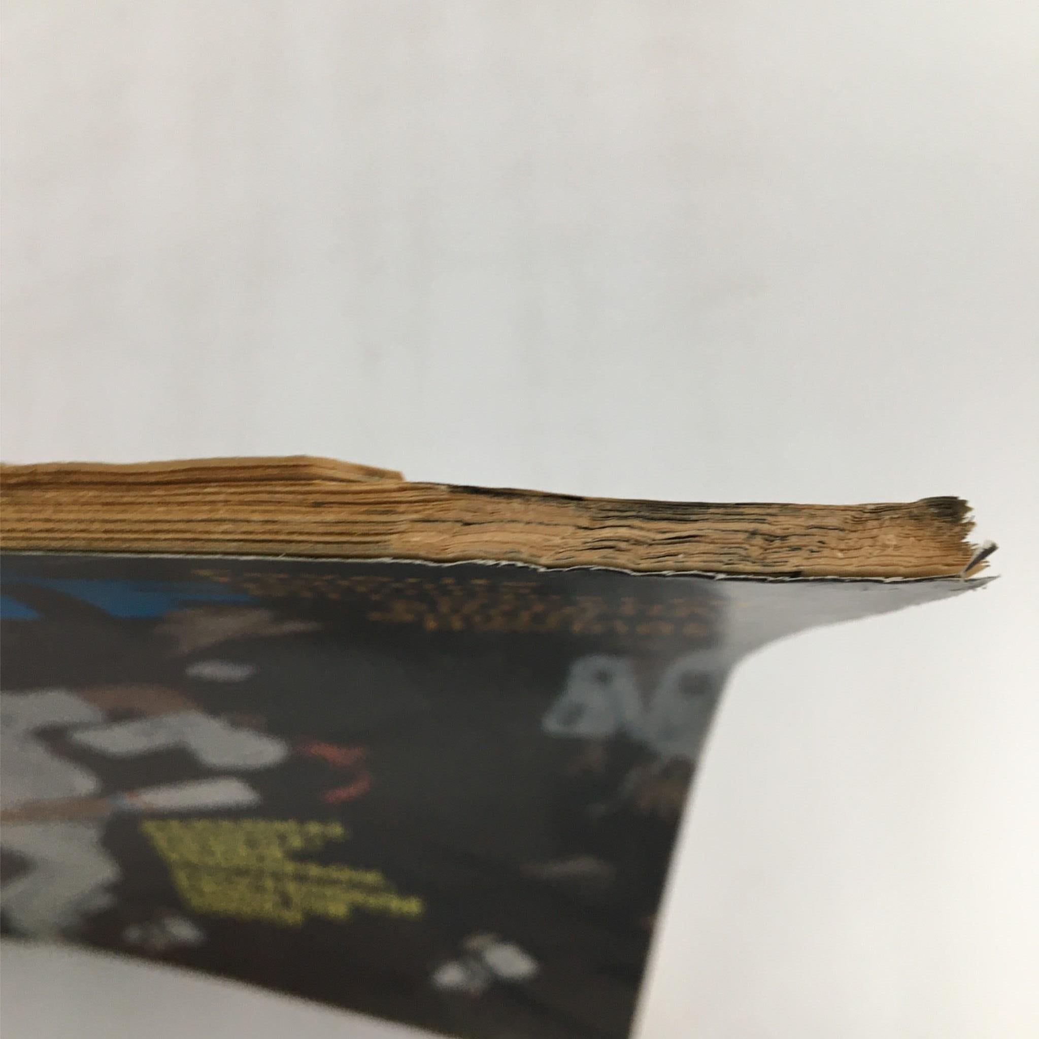Side view of the Official Karate Magazine March 1975 showing wear and aging, highlighting the vintage condition of this karate collectible.