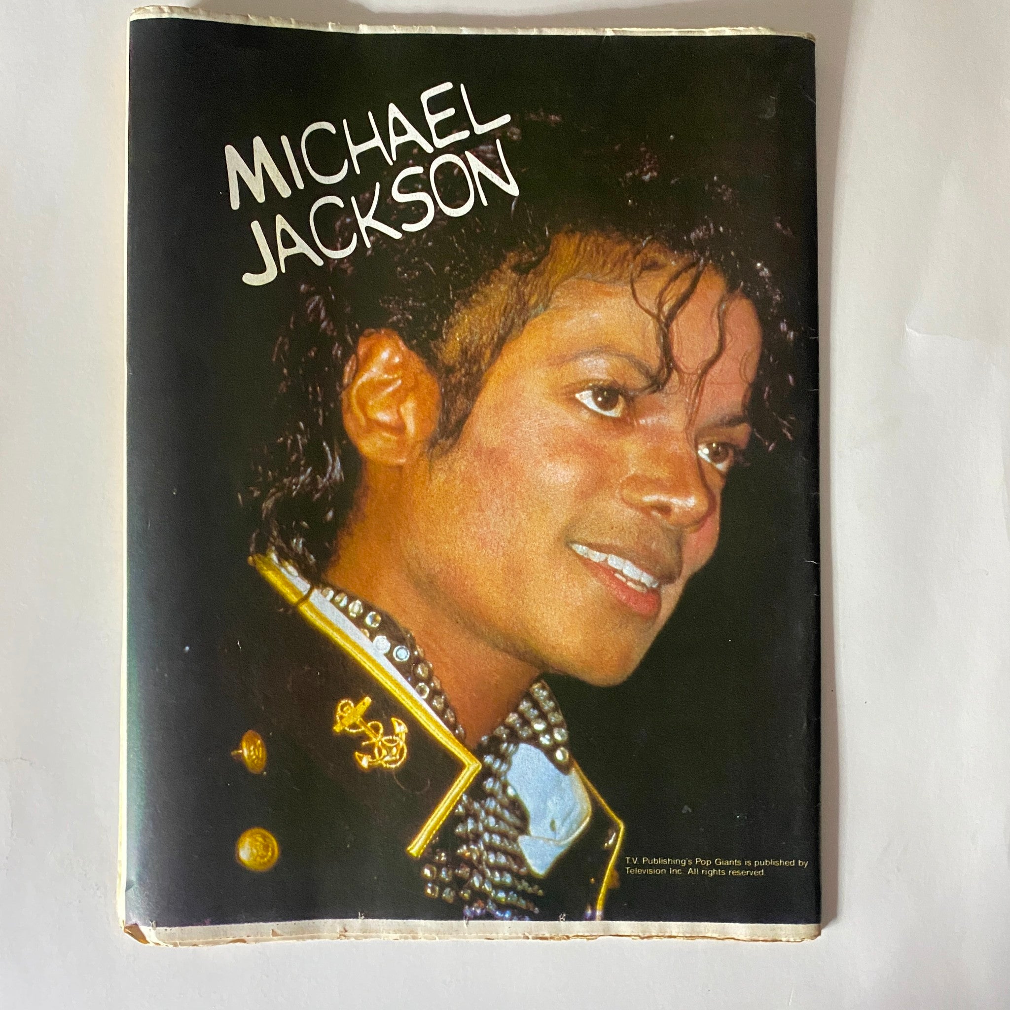Cover of VTG Pop TV Giants Magazine 1984 Michael Jackson featuring a vibrant portrait of him smiling, showcasing his iconic style.