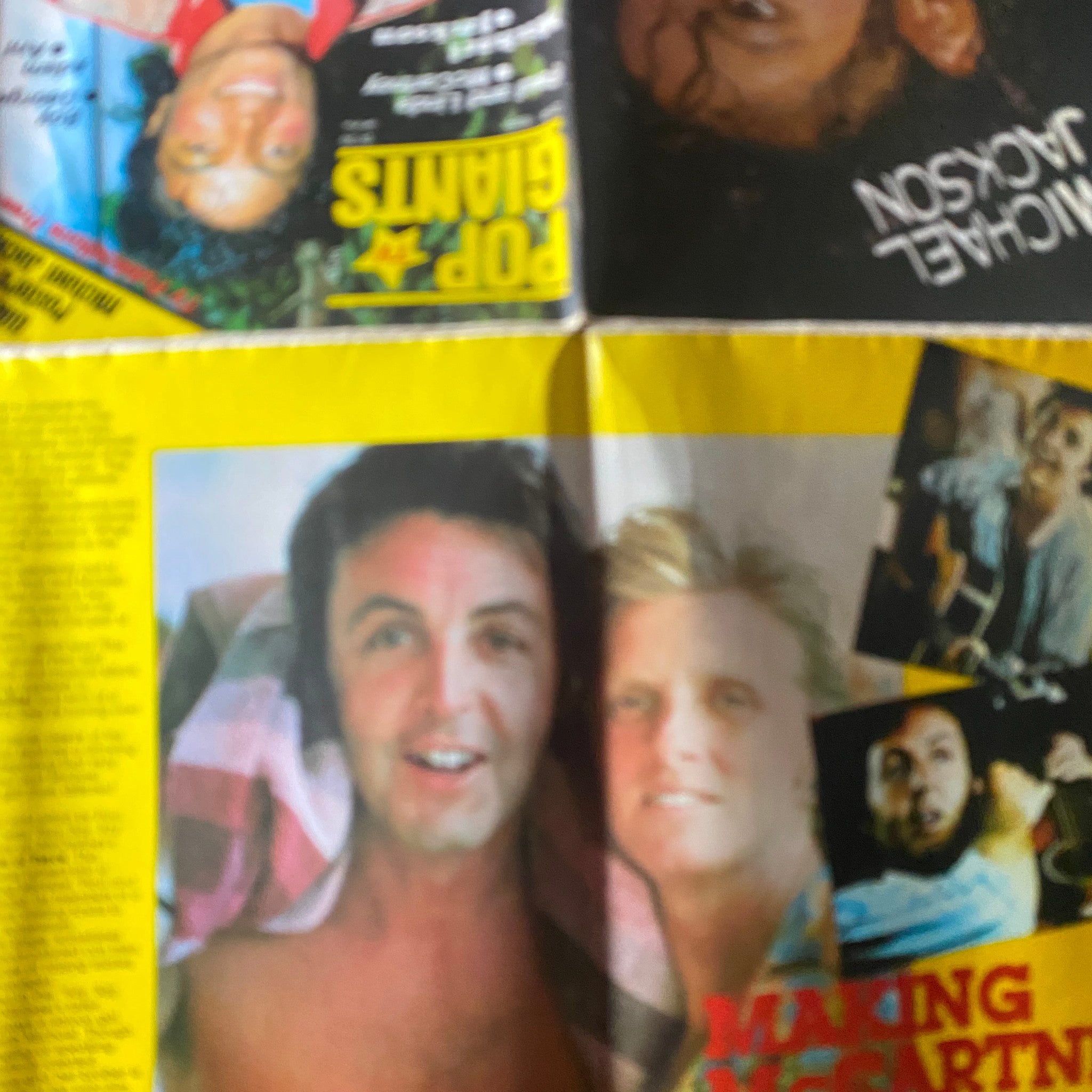 Folded pages of VTG Pop TV Giants Magazine 1984 showing Michael Jackson with additional images, emphasizing the pop culture of the era.