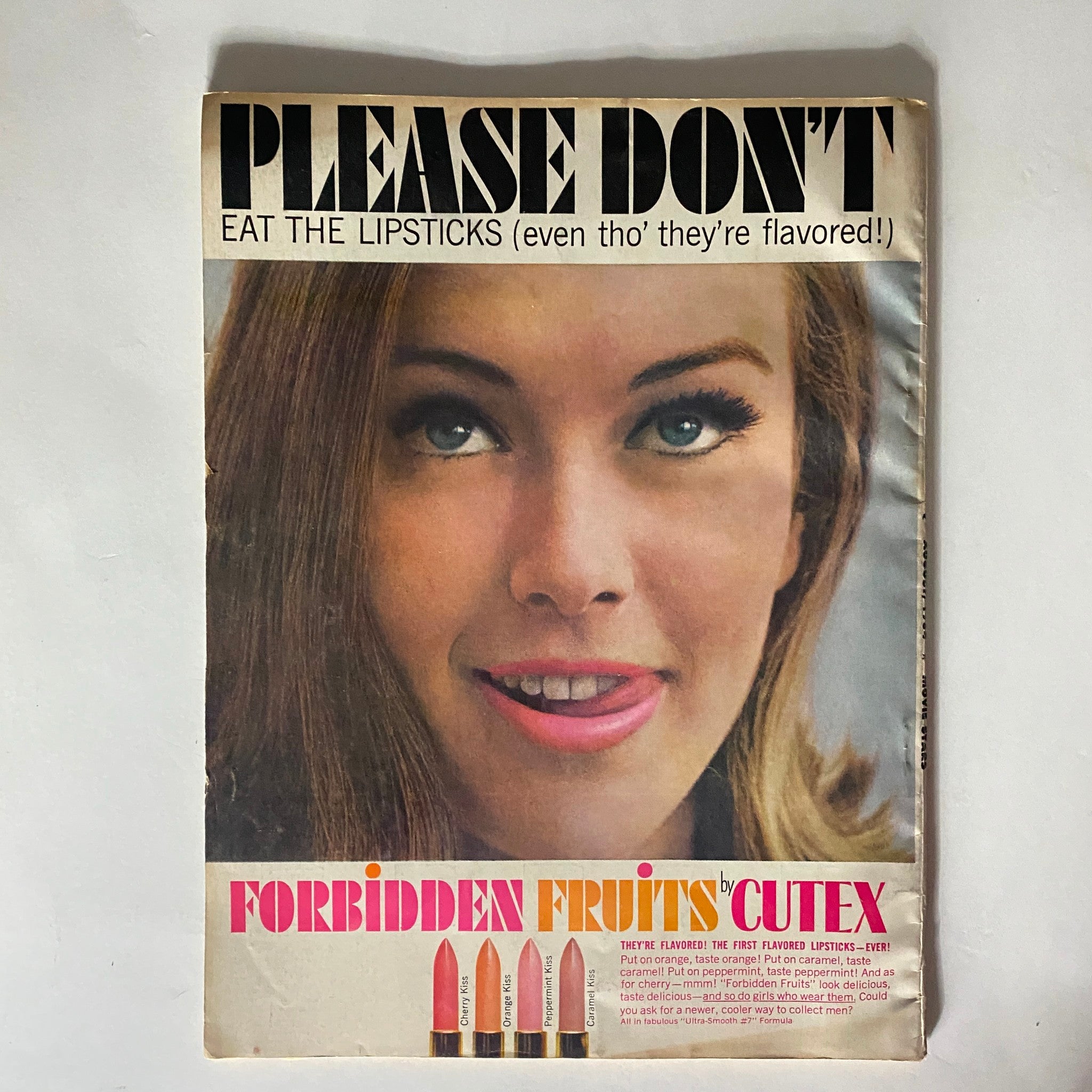 VTG Movie Stars Magazine August 1964 cover image highlighting the playful warning about flavored lipsticks under the brand Cutex, with a vibrant photo of a model.