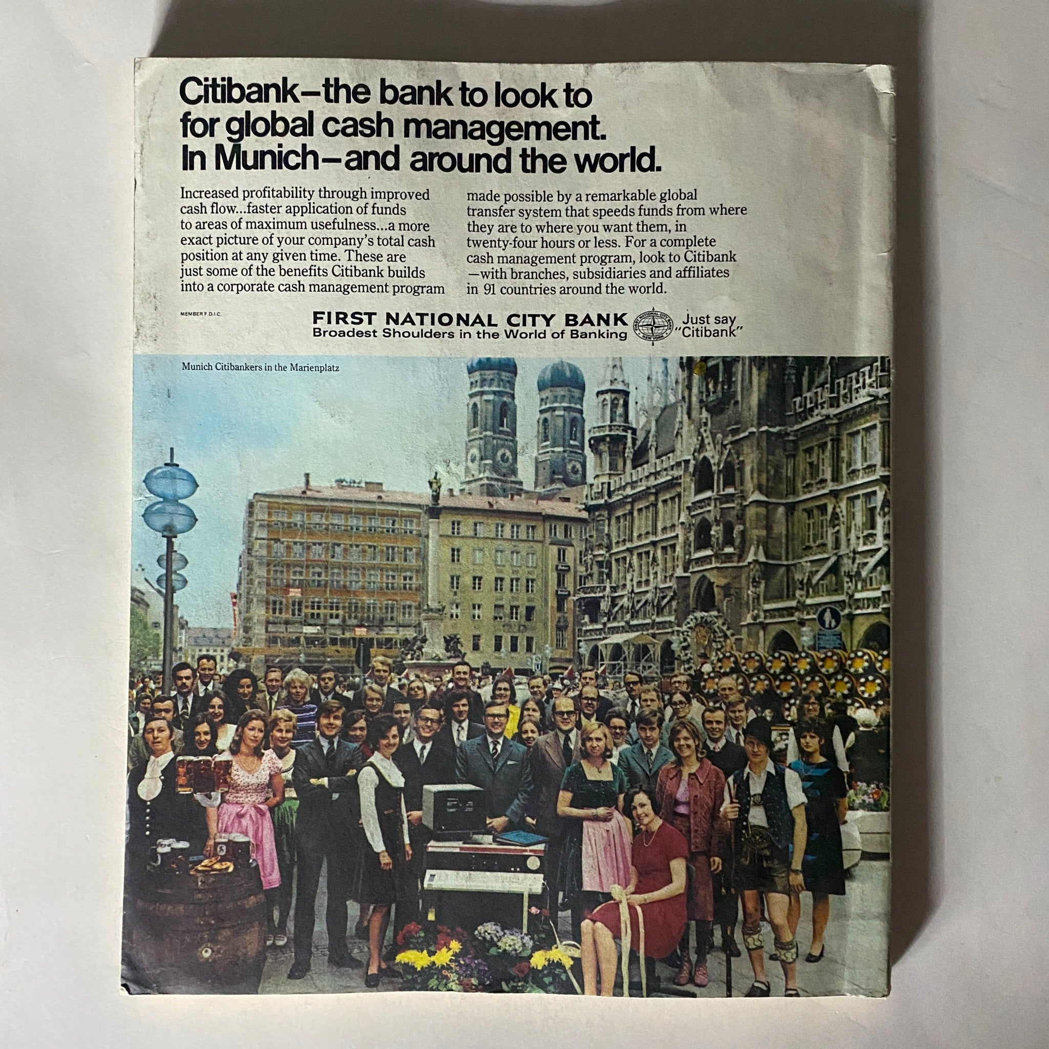 Back cover of the VTG Fortune Magazine July 1973 featuring an advertisement for Citibank, displaying a group photo in Munich's Marienplatz with a focus on global cash management services.