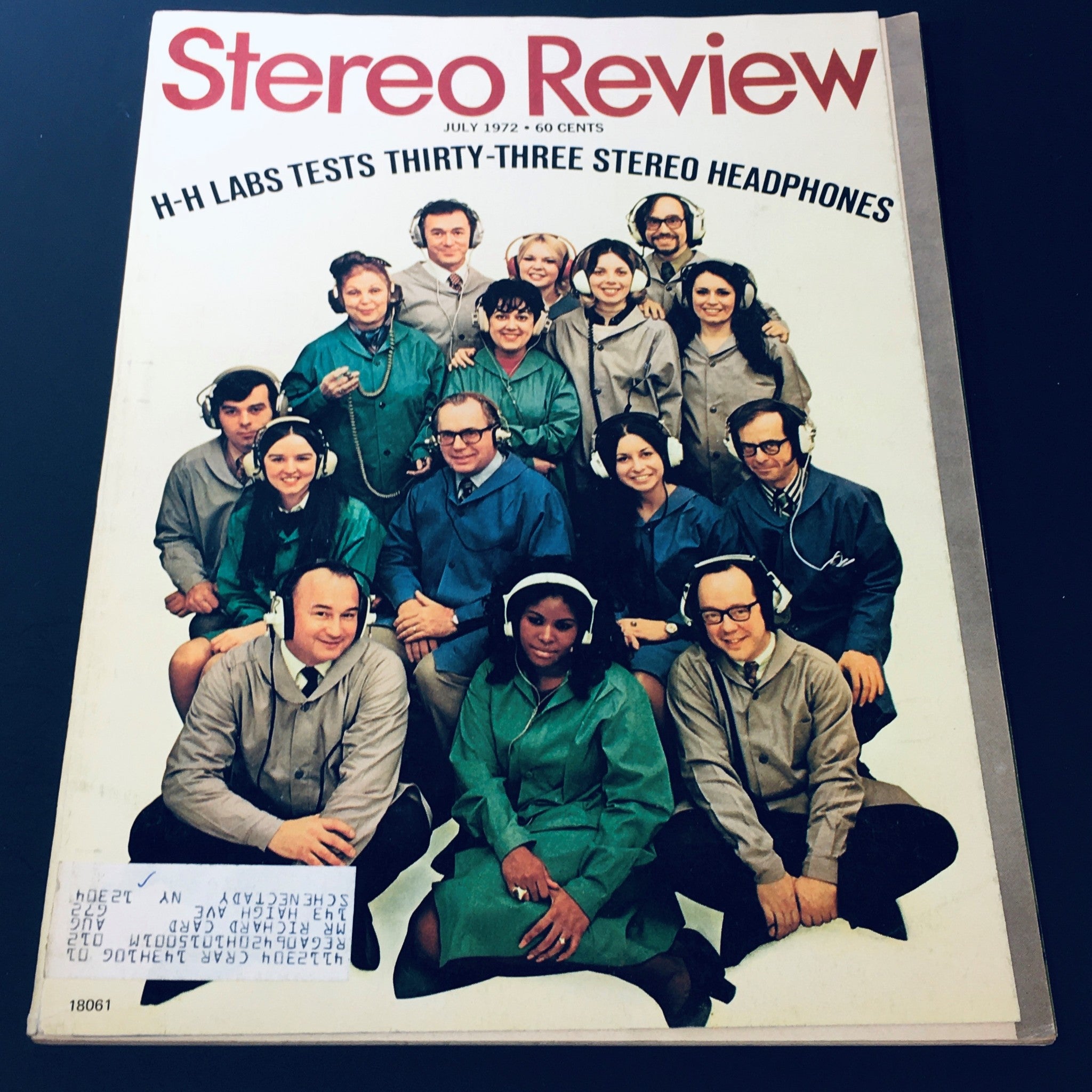 Cover of VTG Stereo Review Magazine July 1972 featuring H-H Labs testing thirty-three stereo headphones, showcasing a group of people wearing headphones in various colored jackets.