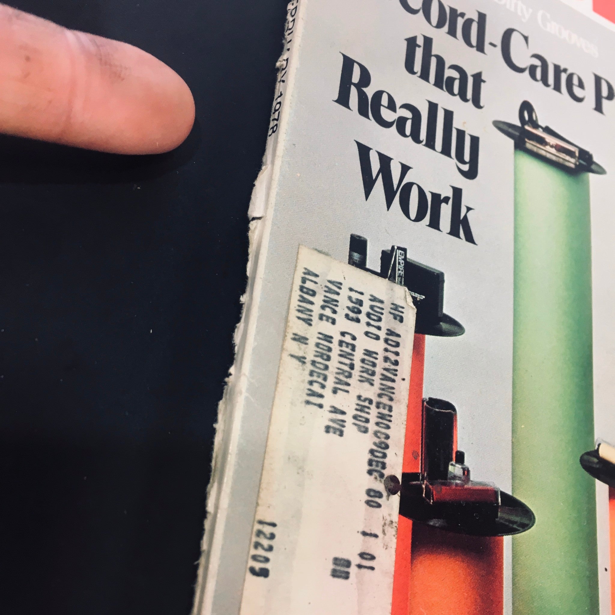 Detail close-up of the side cover of High Fidelity Magazine February 1978, featuring a price sticker and a label from an audio shop.