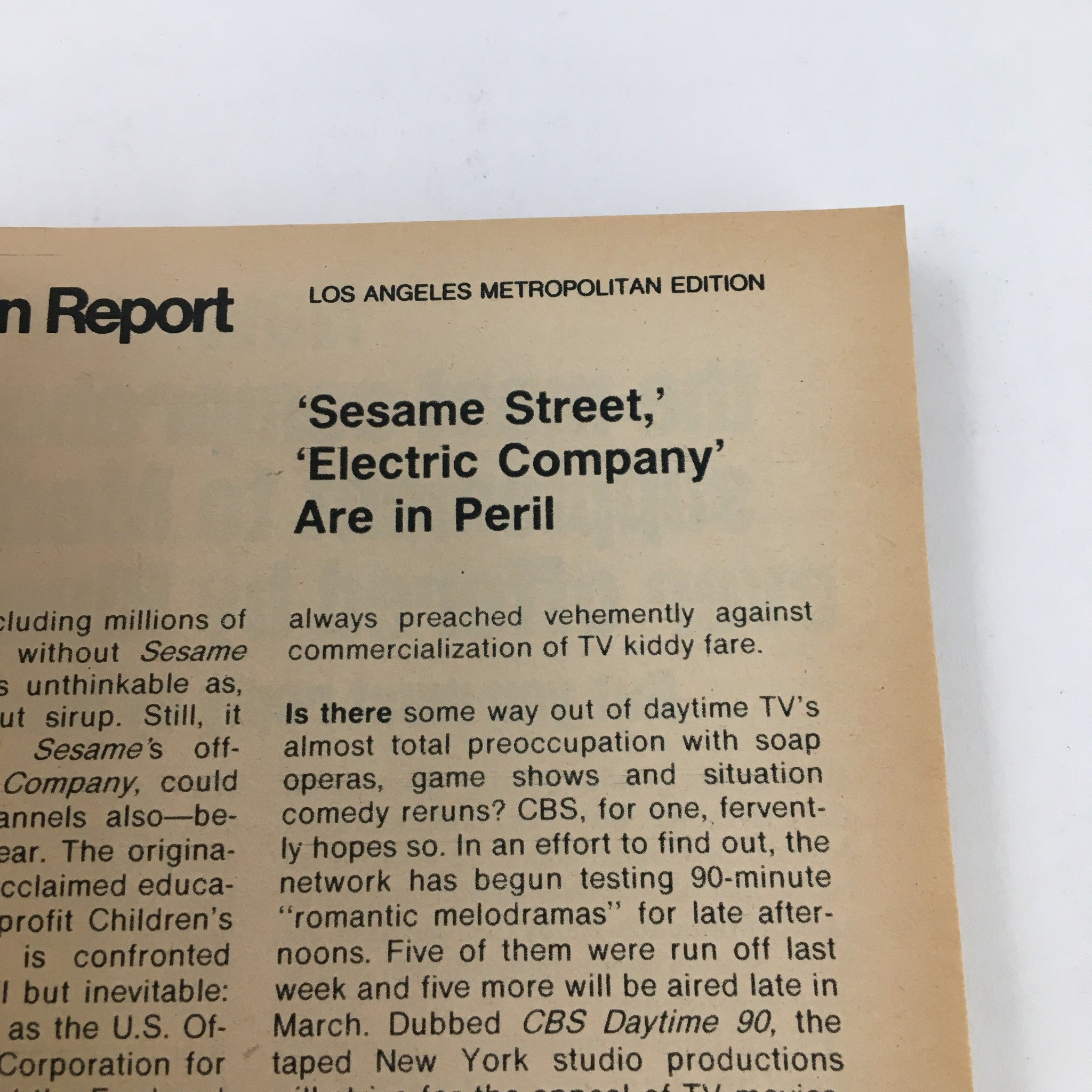 Page from TV Guide Magazine February 23, 1974 featuring an article discussing the challenges faced by 'Sesame Street' and 'Electric Company', highlighting concerns over children's programming in the television landscape.