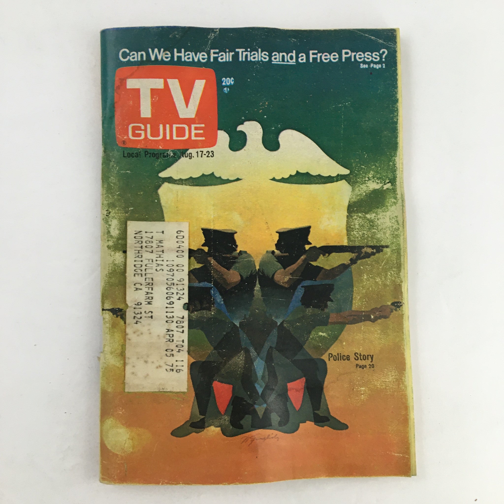 Cover of TV Guide Magazine August 17 1974 titled 'Can We Have Fair Trials and a Free Press?' featuring a vibrant illustration of police officers and an eagle, representative of the media and justice themes.