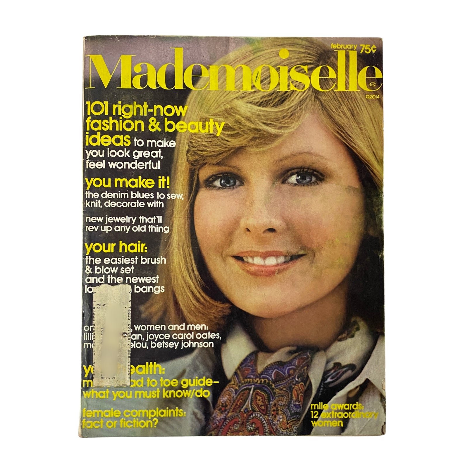 Cover of Mademoiselle Magazine February 1974 featuring the title '101 Right-Now Fashion & Beauty Ideas' with a model showcasing a hairstyle and fashion accessories.