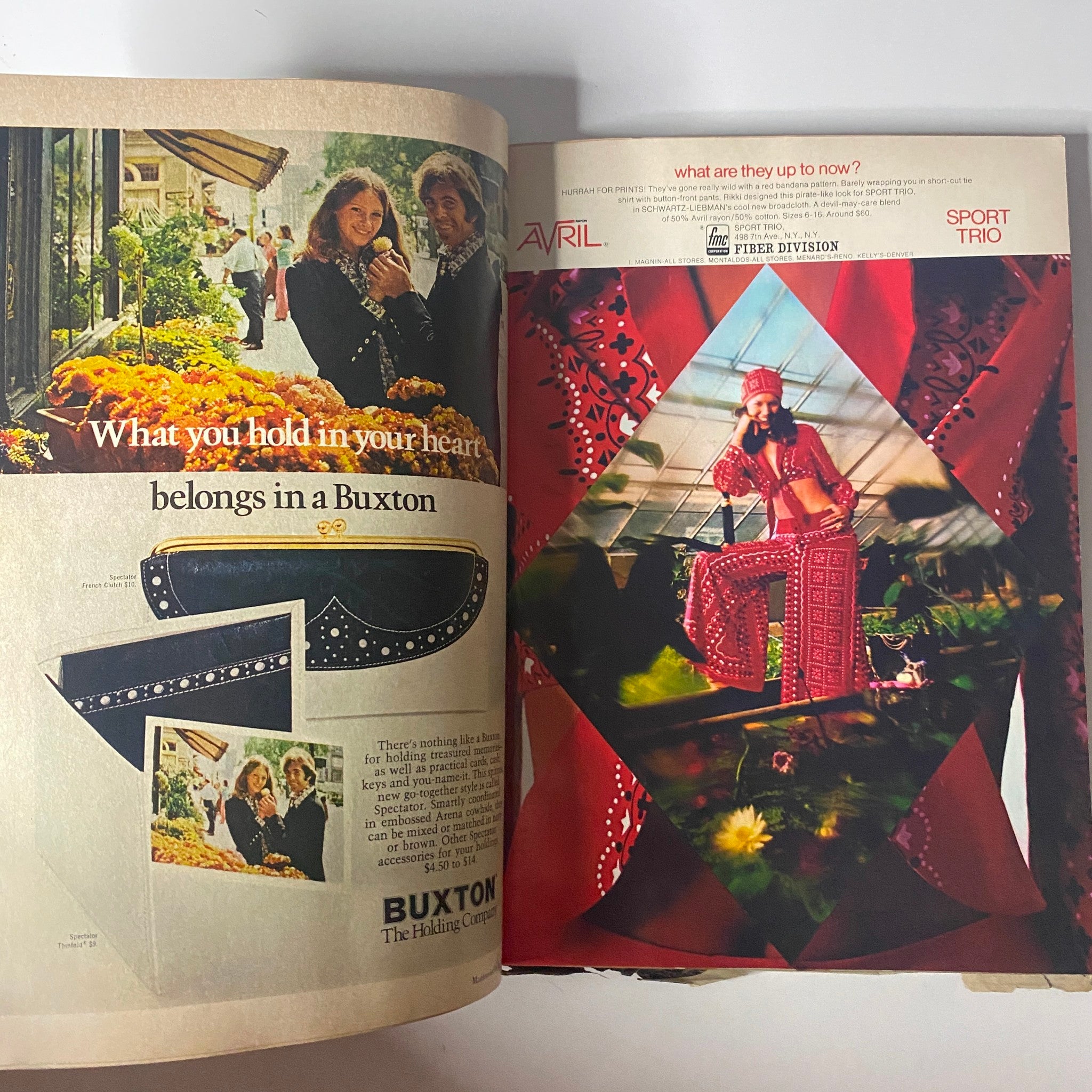 Interior view of Mademoiselle Magazine April 1973 featuring an advertisement for Buxton products, showcasing vibrant colors and fashion elements.