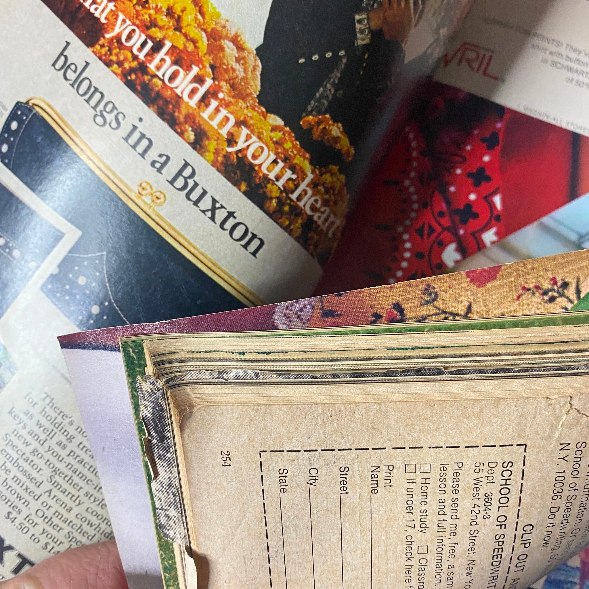 Close-up of Mademoiselle Magazine April 1973 showing a highlighted section with pages slightly bent, adding a vintage texture to the magazine.