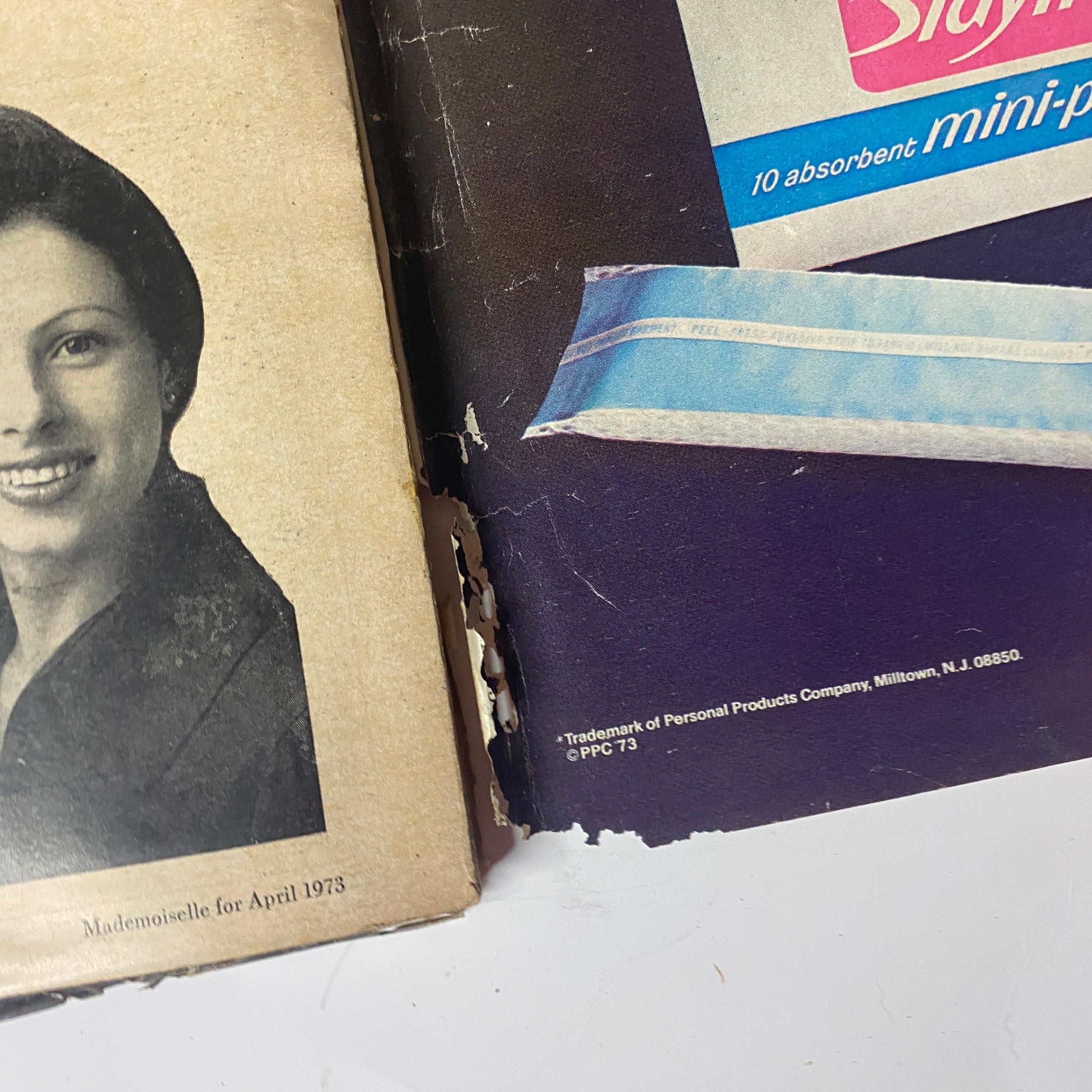 Back cover of Mademoiselle Magazine April 1973 featuring an ad for Max Factor's Pure Magic Super Clear Make-Up, emphasizing natural beauty.