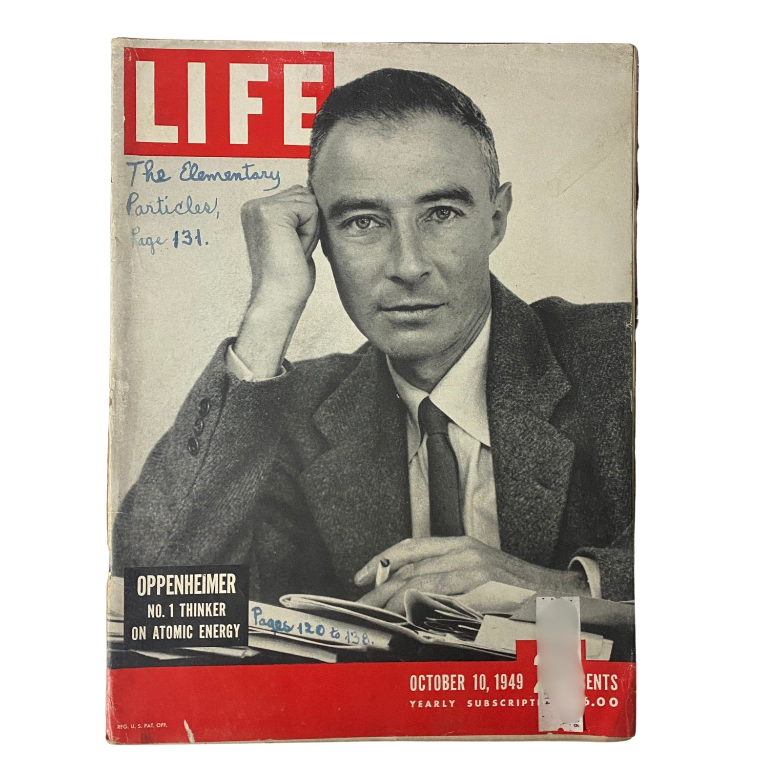 Cover of LIFE Magazine from October 10, 1949, Vol 27 No. 15 featuring J. Robert Oppenheimer, highlighting his profile as a significant figure in atomic energy, with handwritten notes on the cover regarding elementary particles.