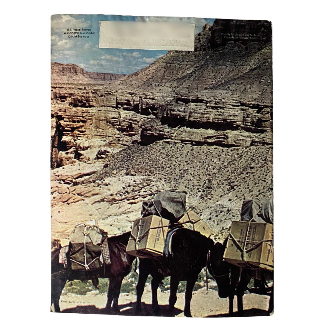 Back cover of VTG Postal Life Magazine September - October 1971, showcasing a line of pack animals carrying cargo in a scenic canyon.