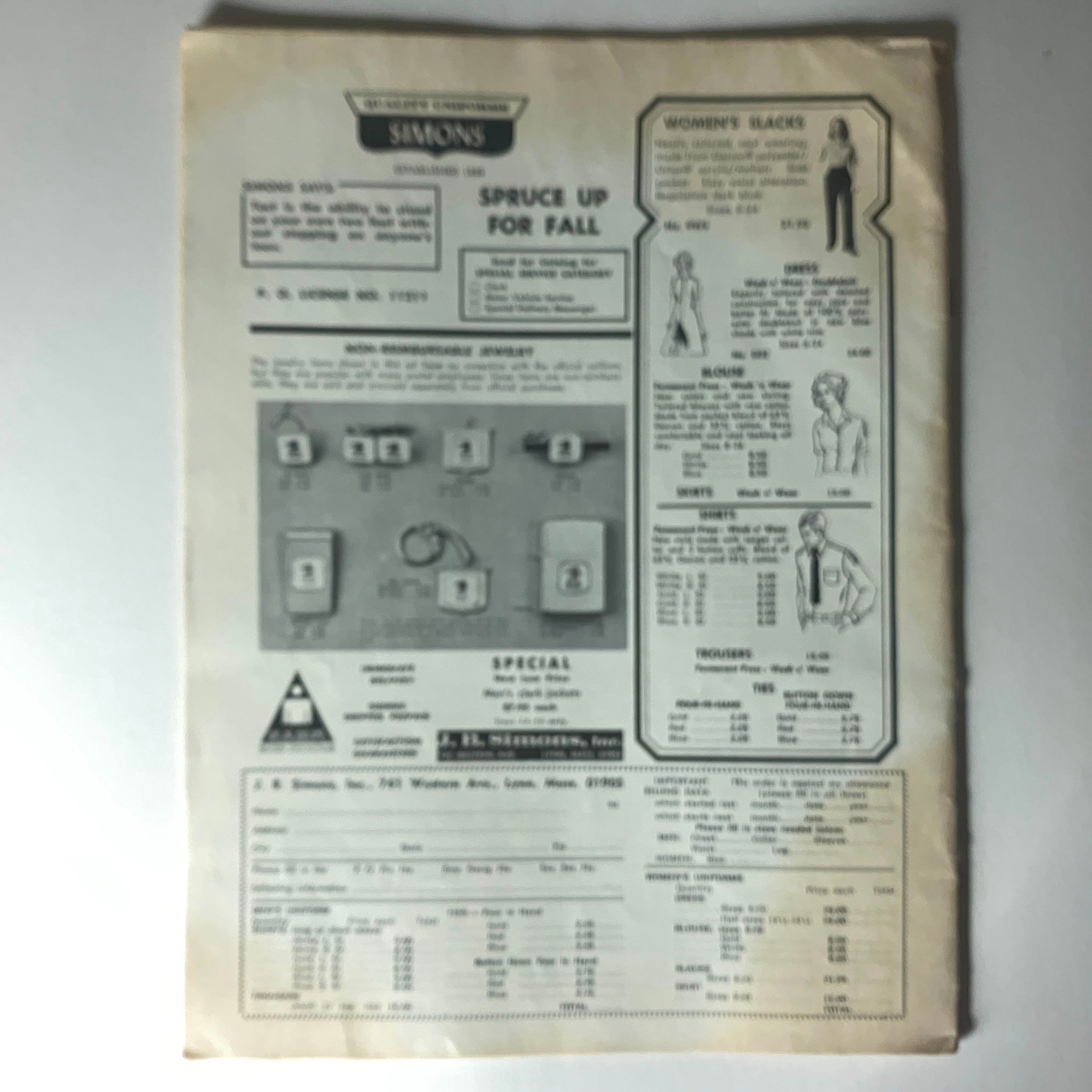 Back cover of the VTG The American Postal Worker Magazine from September 1974, featuring advertisements and offers for various clothing and accessories, emphasizing fall styles.