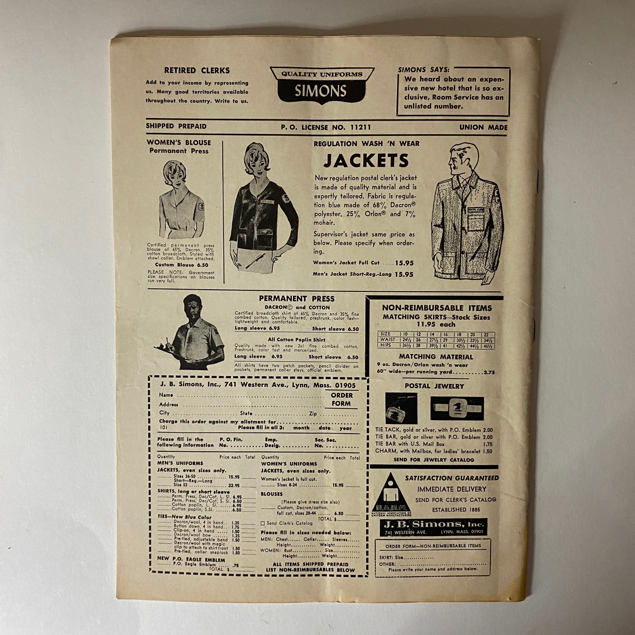 Back page of The American Postal Worker Magazine - October 1971 showcasing uniform advertisements for postal workers including jackets and blouses.