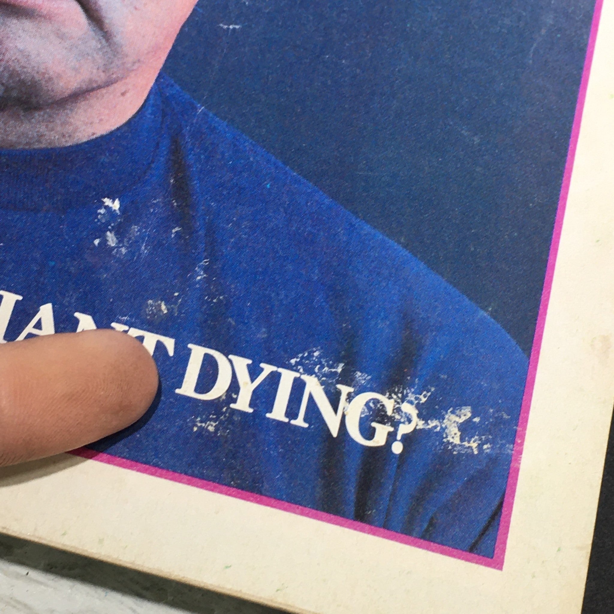 Detail of Mother Jones Magazine April 1978 with focus on a man's image and the question 'Is the Giant Dying?' showcasing wear typical for vintage publications.