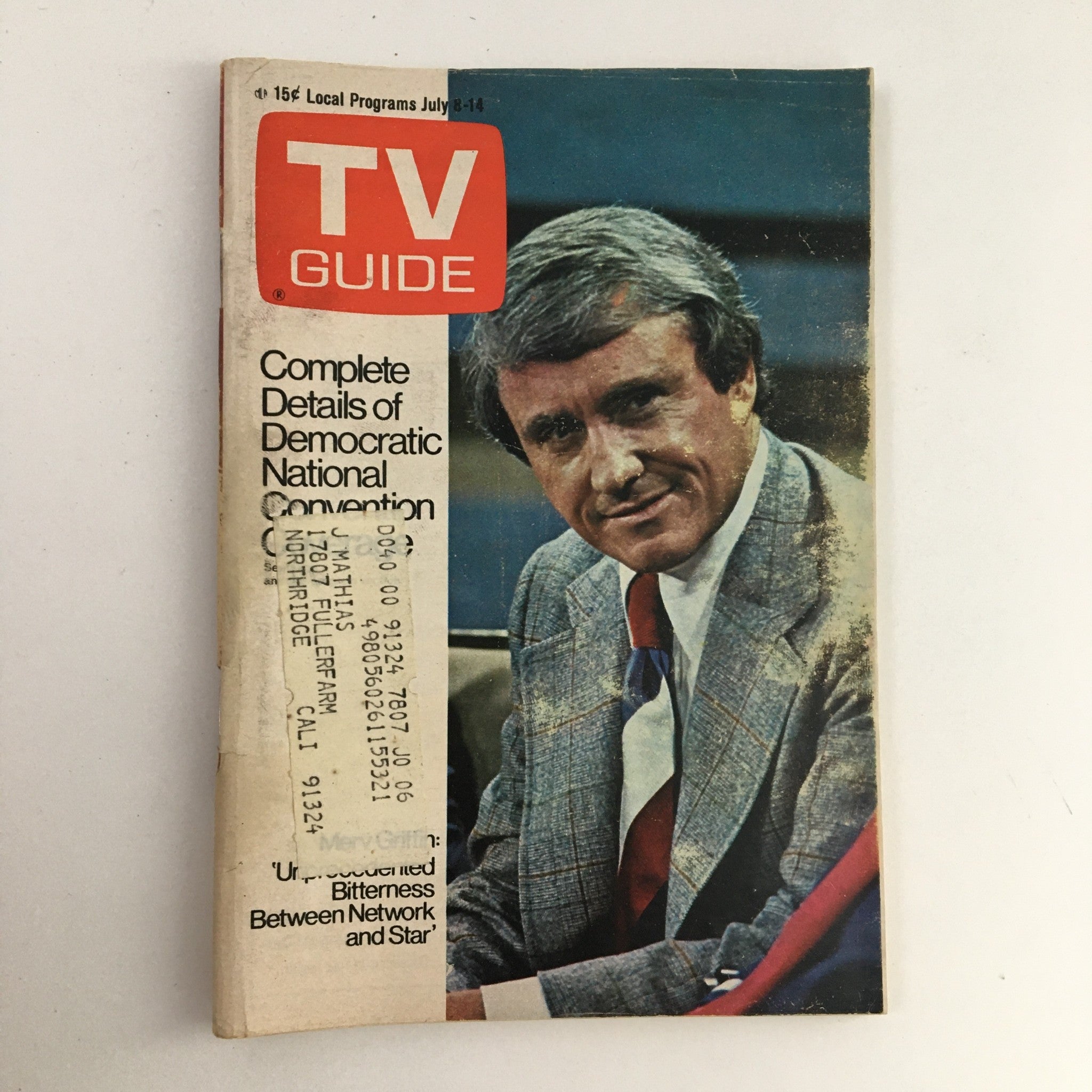 Cover of TV Guide Magazine from July 8, 1972 featuring media mogul Merv Griffin. The magazine showcases the headline 'Complete Details of Democratic National Convention' with Merv Griffin prominently displayed in a suit, reflecting the charm of vintage television memorabilia.