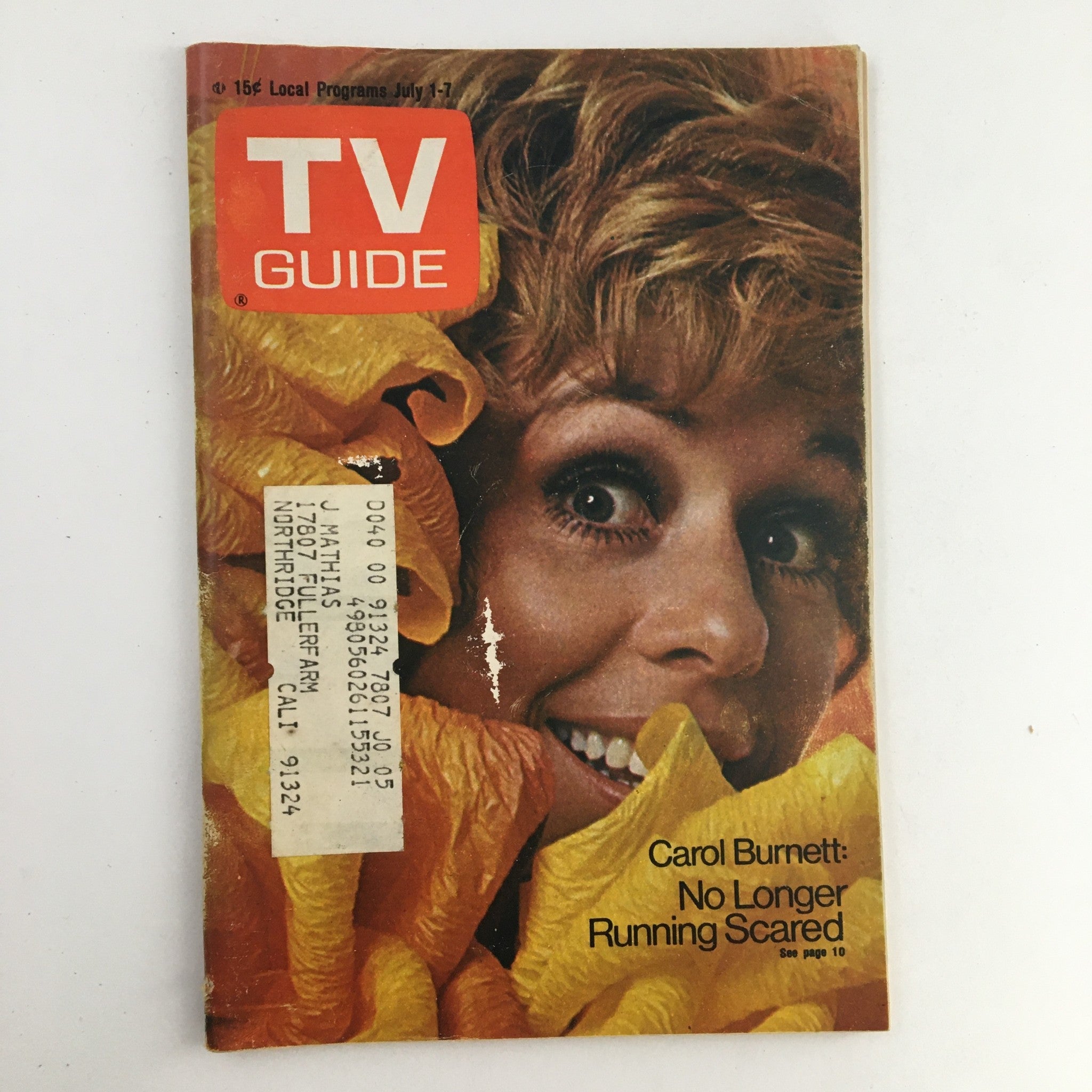 TV Guide Magazine cover from July 1, 1972, featuring Carol Burnett with a bright floral background, highlighting the theme 'No Longer Running Scared.' This vintage issue captures an iconic moment in television history.
