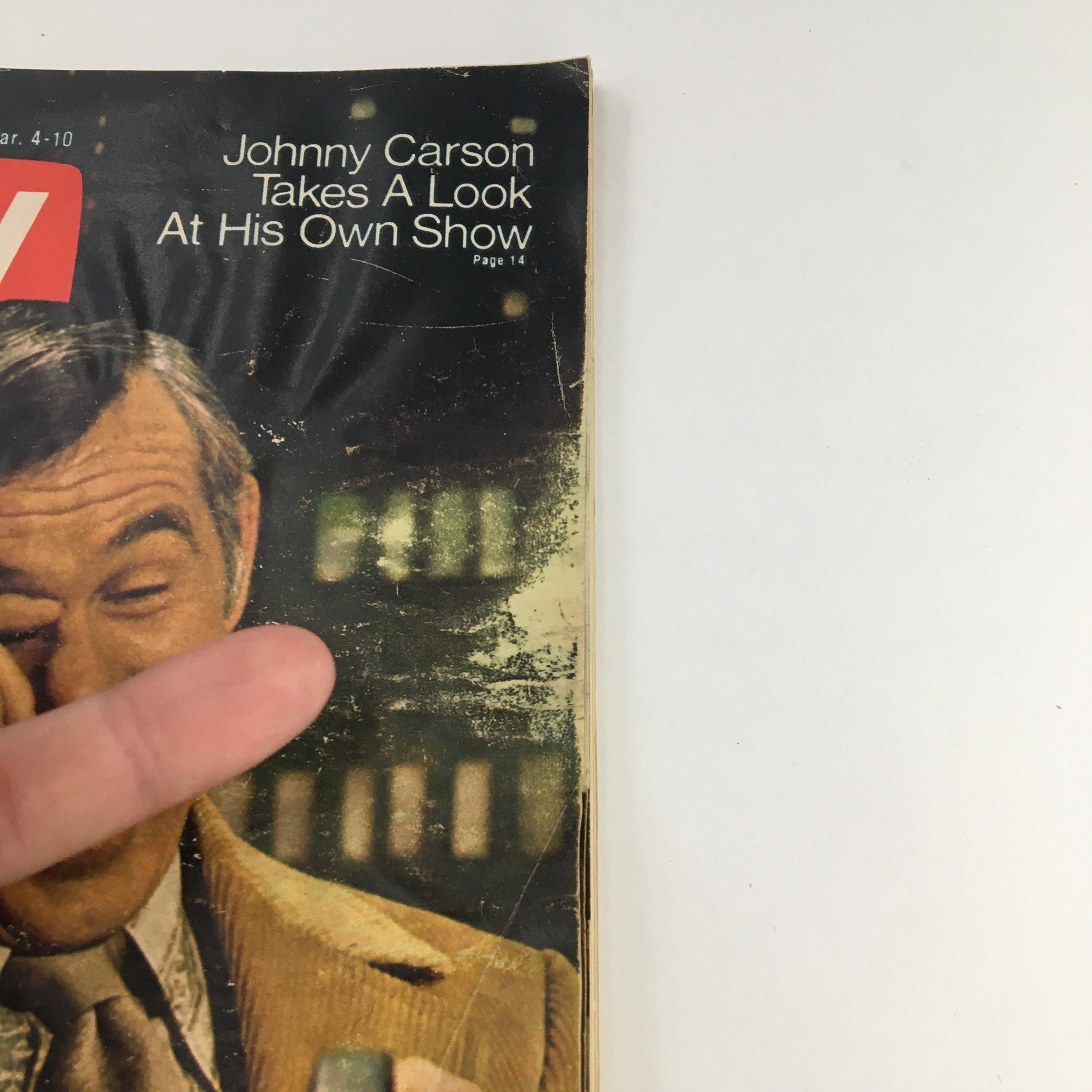 Close-up of the TV Guide Magazine from March 4, 1972 featuring Johnny Carson, highlighting the title and worn edges of the magazine cover.