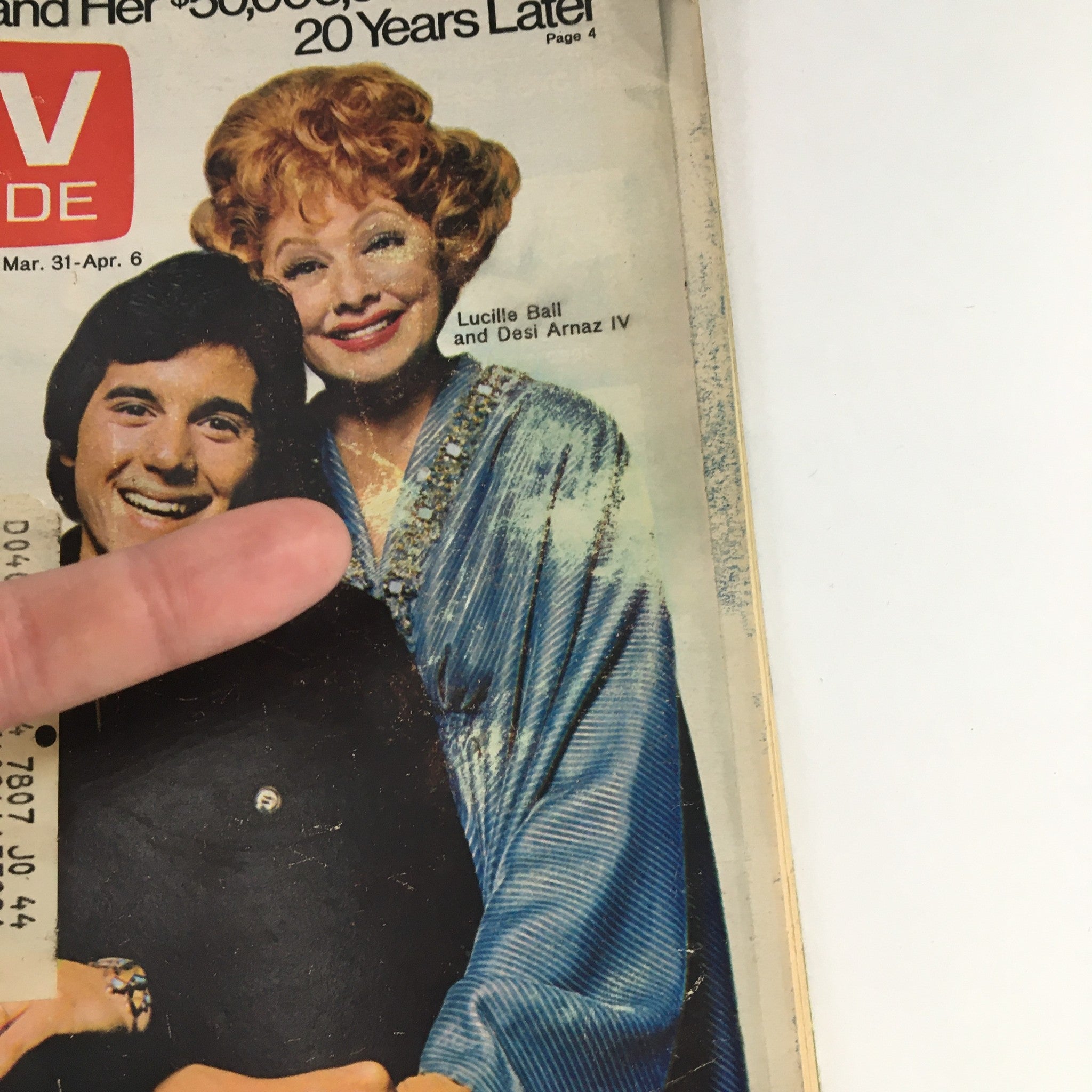 Close-up of the cover of TV Guide Magazine March 31, 1973, showing Lucille Ball and Desi Arnaz IV smiling for the camera.