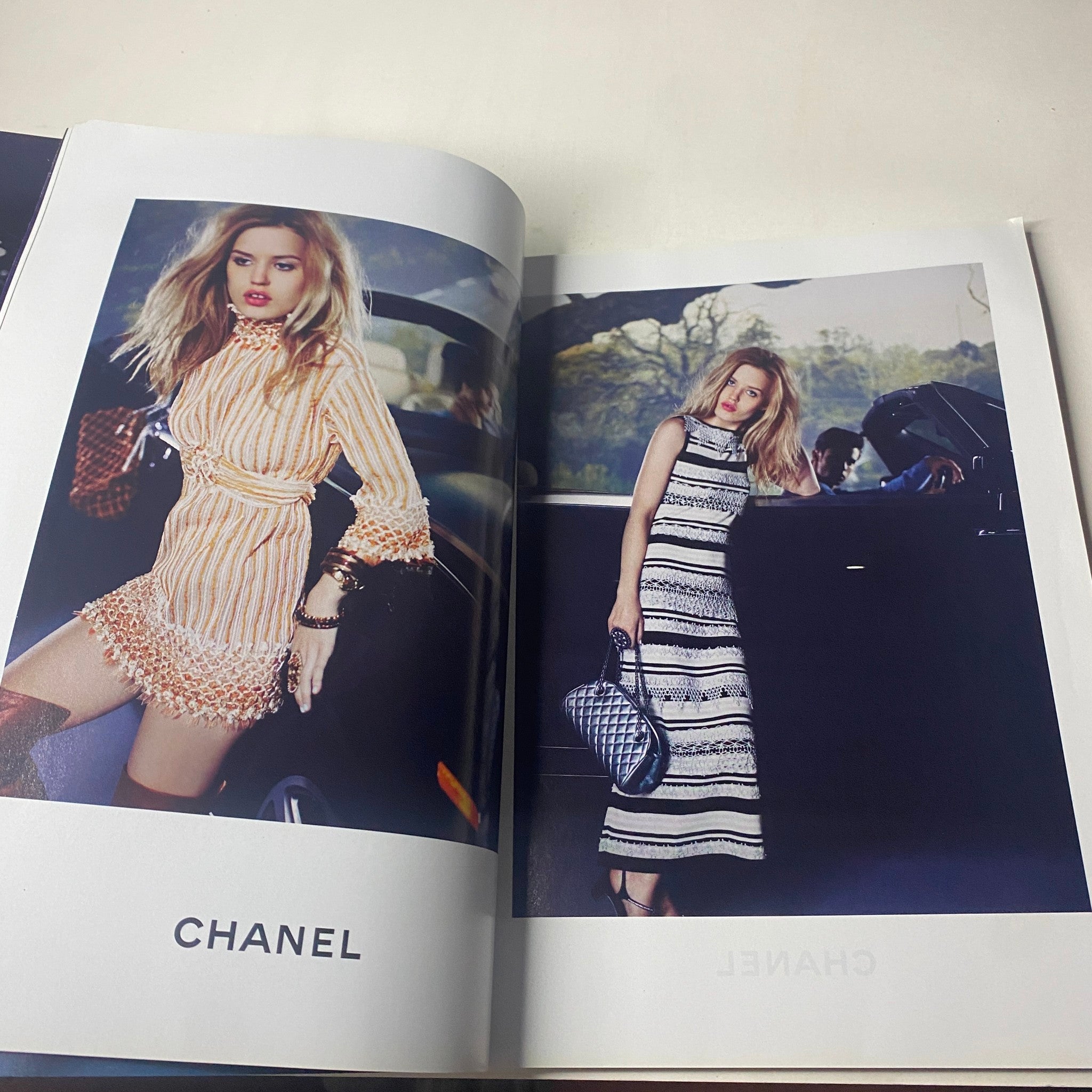 Fashion advertisement from Harper's Bazaar Australia December 2010 featuring Chanel's latest designs on a model within a luxurious setting.