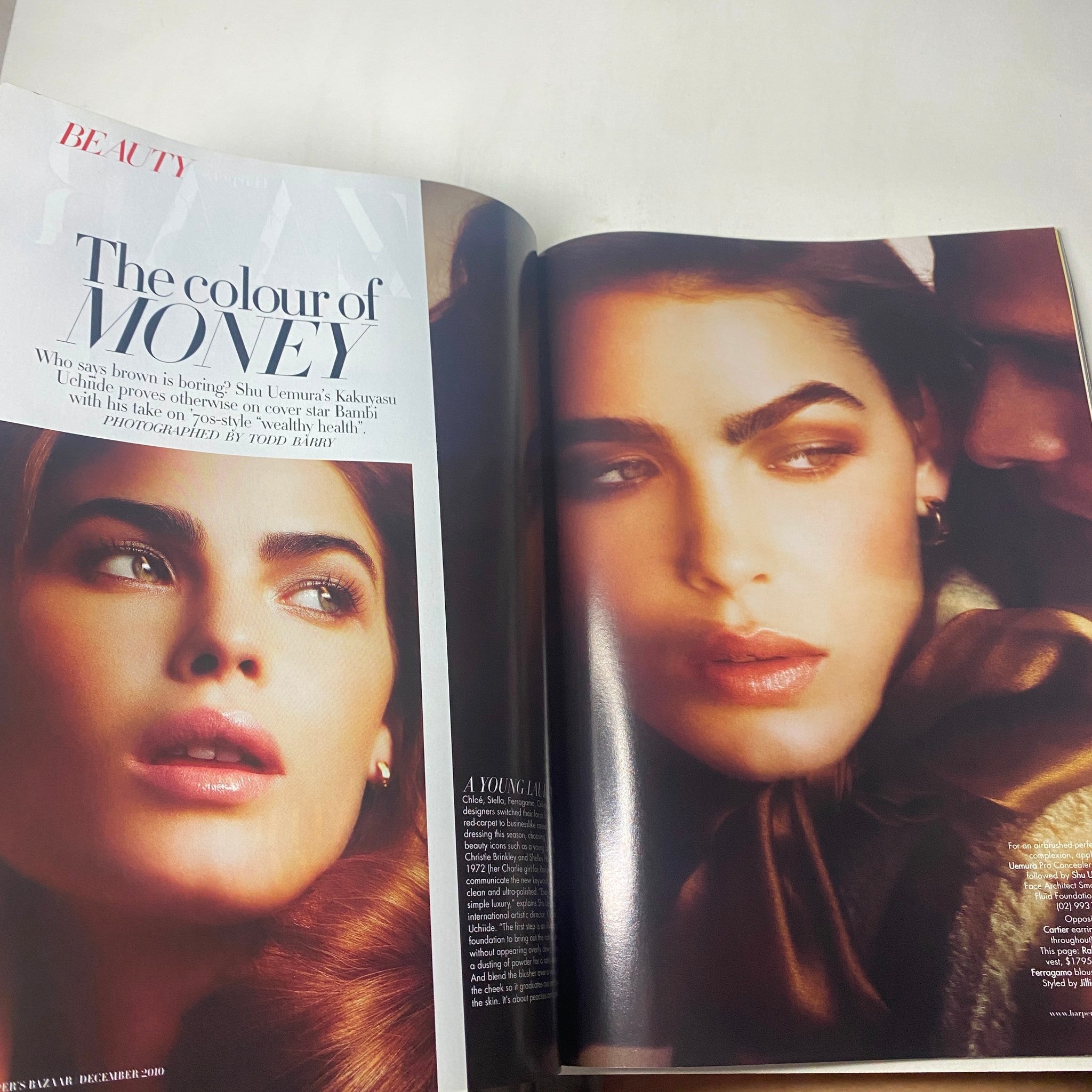 Harper's Bazaar Australia Magazine December 2010 featuring an editorial titled 'The Colour of Money,' showcasing a model with glamorous makeup and striking features, photographed by David Slijper.