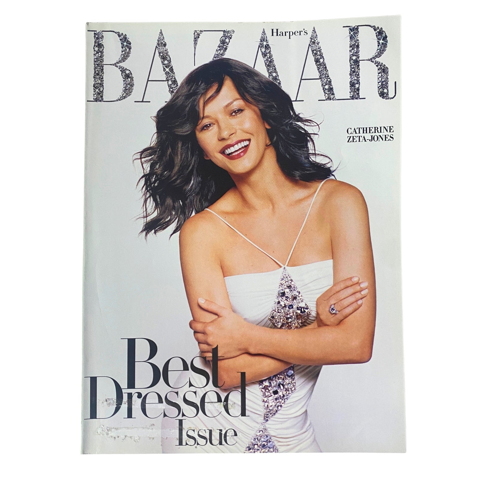 Harper's Bazaar Magazine December 2004 featuring Catherine Zeta-Jones on the cover, categorized as Best Dressed Issue, showcasing her elegant look with a sparkling design.