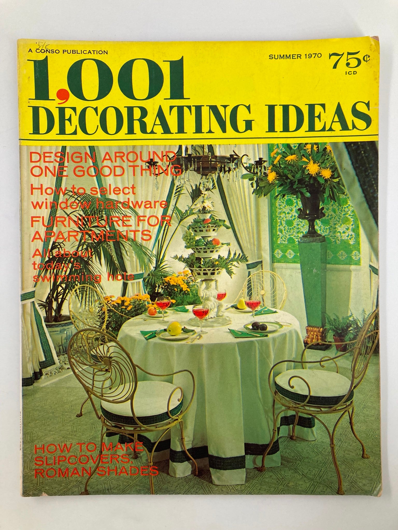 Vintage 1001 Decorating Ideas Magazine cover from Summer 1970 showcasing a beautifully decorated dining area with a stylish table setting and vibrant flowers. This issue features the intriguing "Skirting the Slipcover" story and offers retro home décor inspiration.
