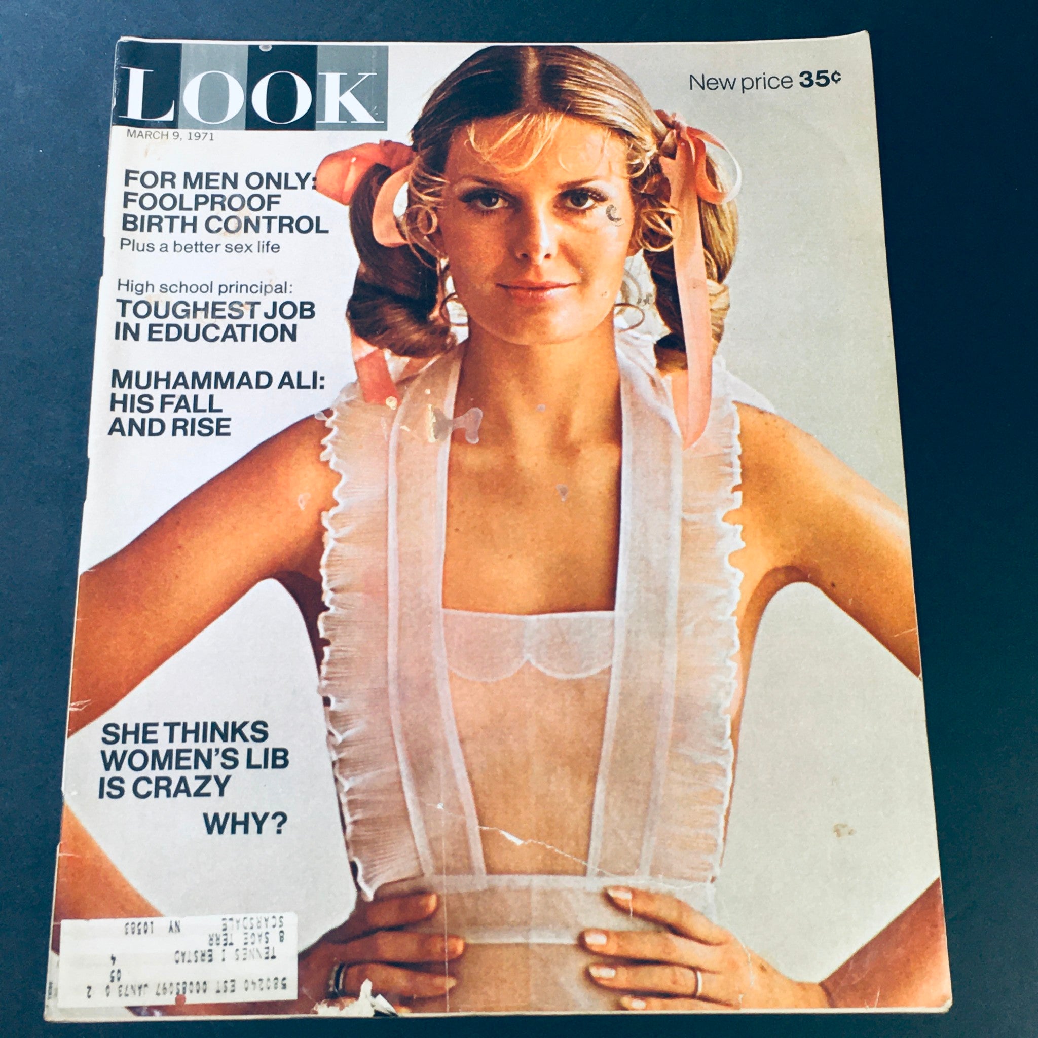Look Magazine March 9, 1971 cover featuring a young woman in a revealing dress, showcasing the title 'FOR MEN ONLY: FOOLPROOF BIRTH CONTROL' and highlights including 'Muhammad Ali: His Fall and Rise' and 'Women's Lib'.