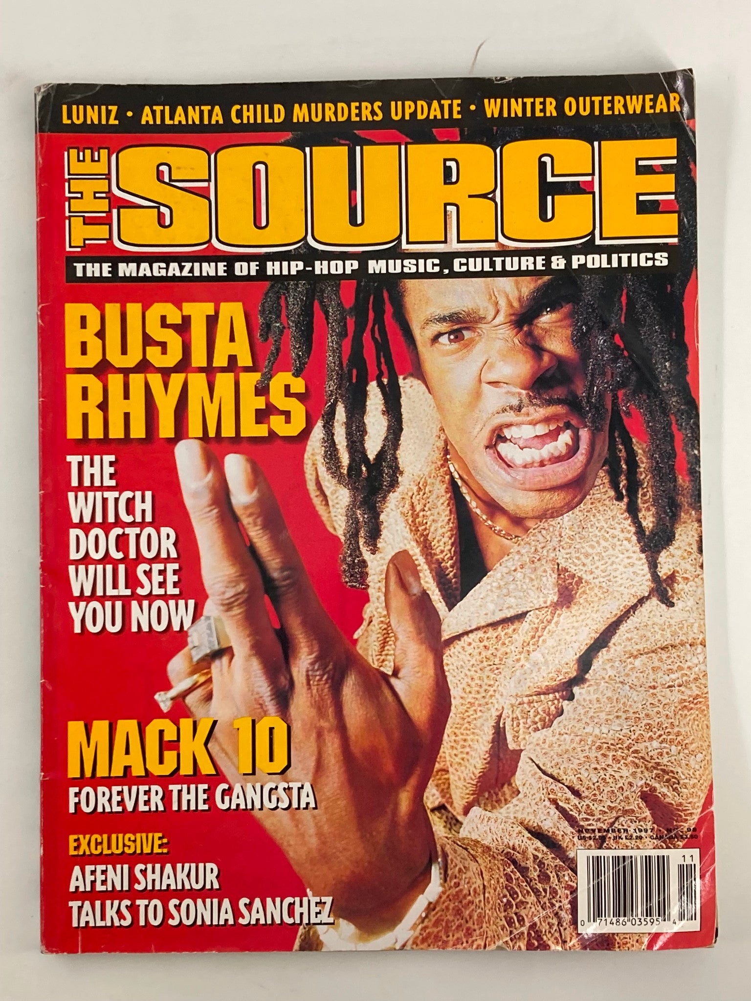 The Source Magazine November 1997, featuring Busta Rhymes on the cover, displaying vibrant colors and bold headlines about hip-hop culture.