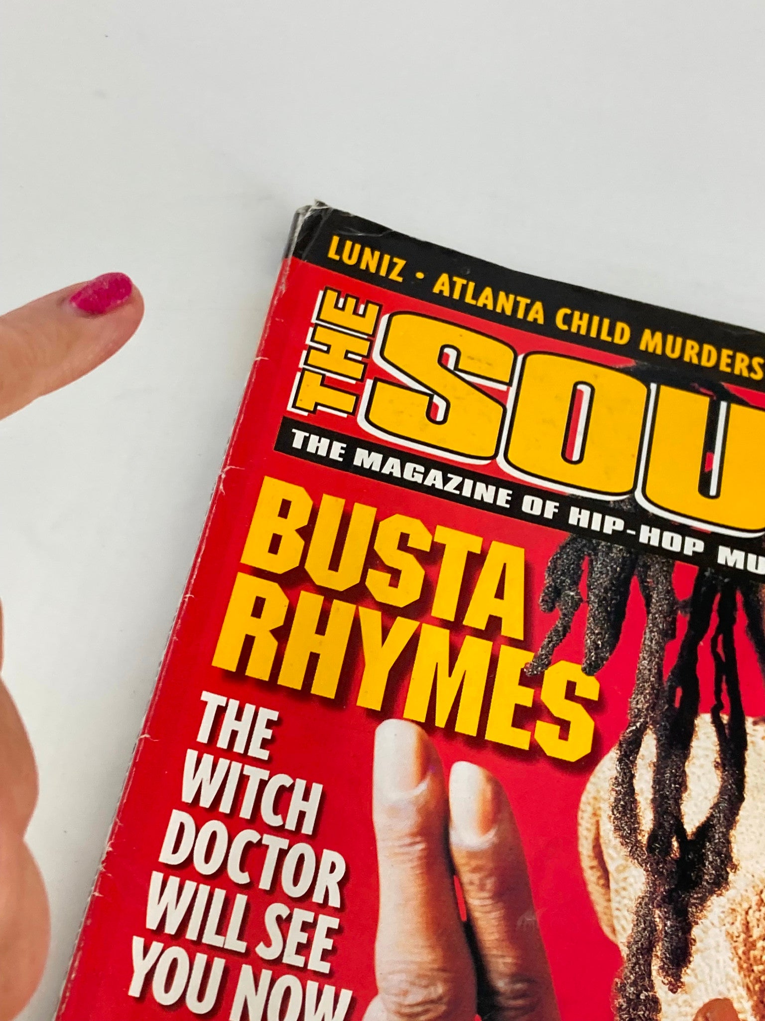 Side view of The Source Magazine November 1997, highlighting Busta Rhymes's cover details and magazine spine.